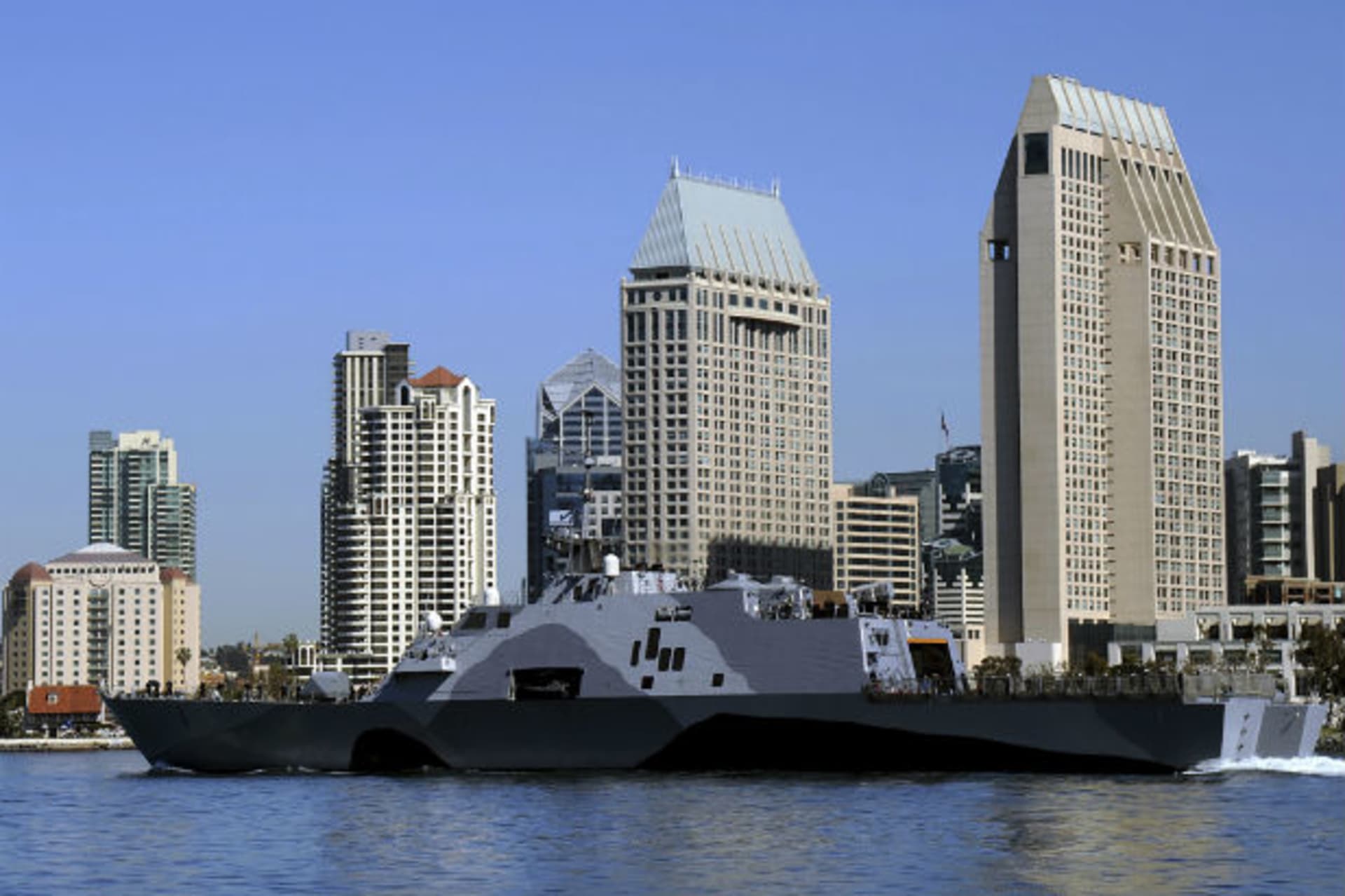 <p>The littoral combat ship USS Freedom (LCS 1) departs for a deployment to the Asia-Pacific region, in San Diego Bay, California. (Christine Walker-Singh/Courtesy Reuters).</p>
