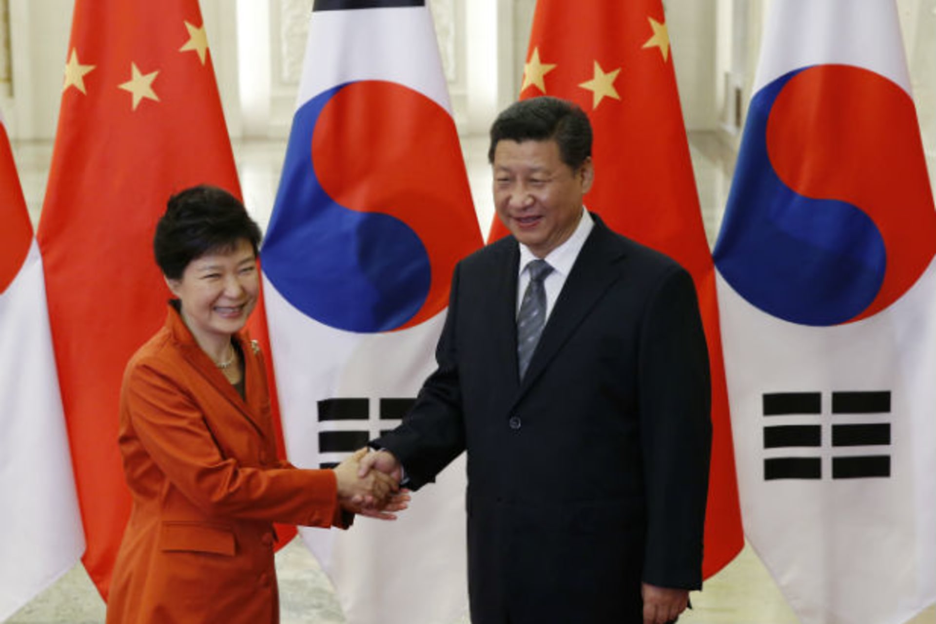 <p>South Korean President Park Geun-hye shakes hands with Chinese President Xi Jinping on the sidelines of the Asia-Pacific Economic Cooperation (APEC) summit in Beijing, China, on November 10, 2014.</p>
