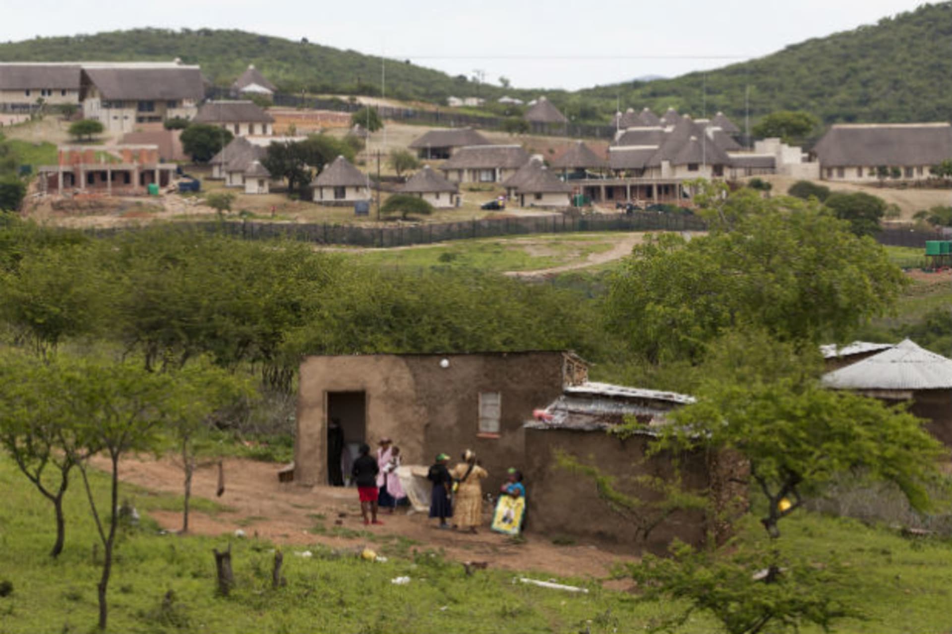 Supporters of South Africa's President Jacob Zuma prepare to prevent opposition Democratic Alliance (DA) party members from walking towards Zuma's house in Nkandla November 4, 2012.