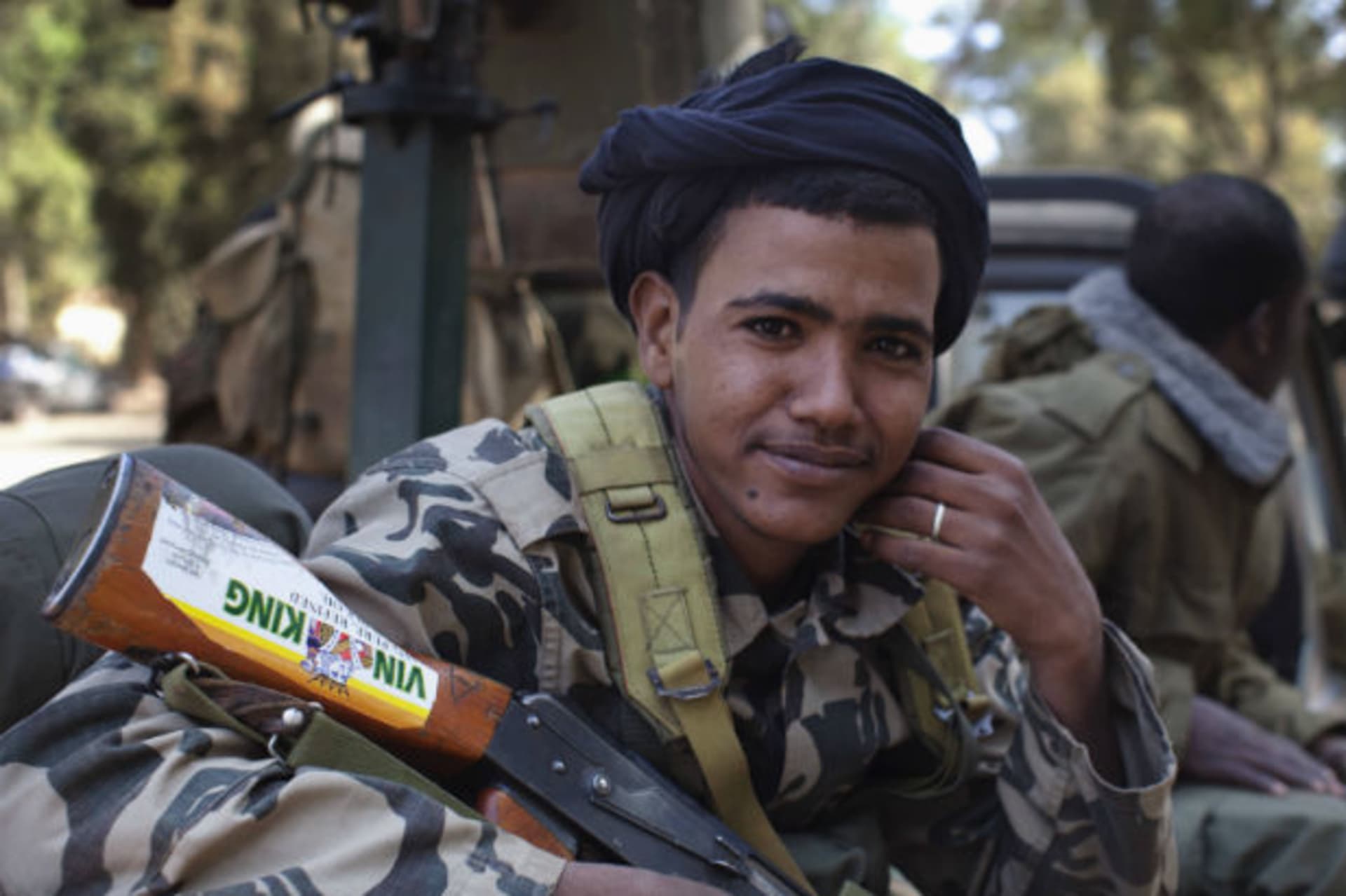 An ethnic Tuareg soldier in the Malian army rides in a pickup truck in Niono January 19, 2013.
