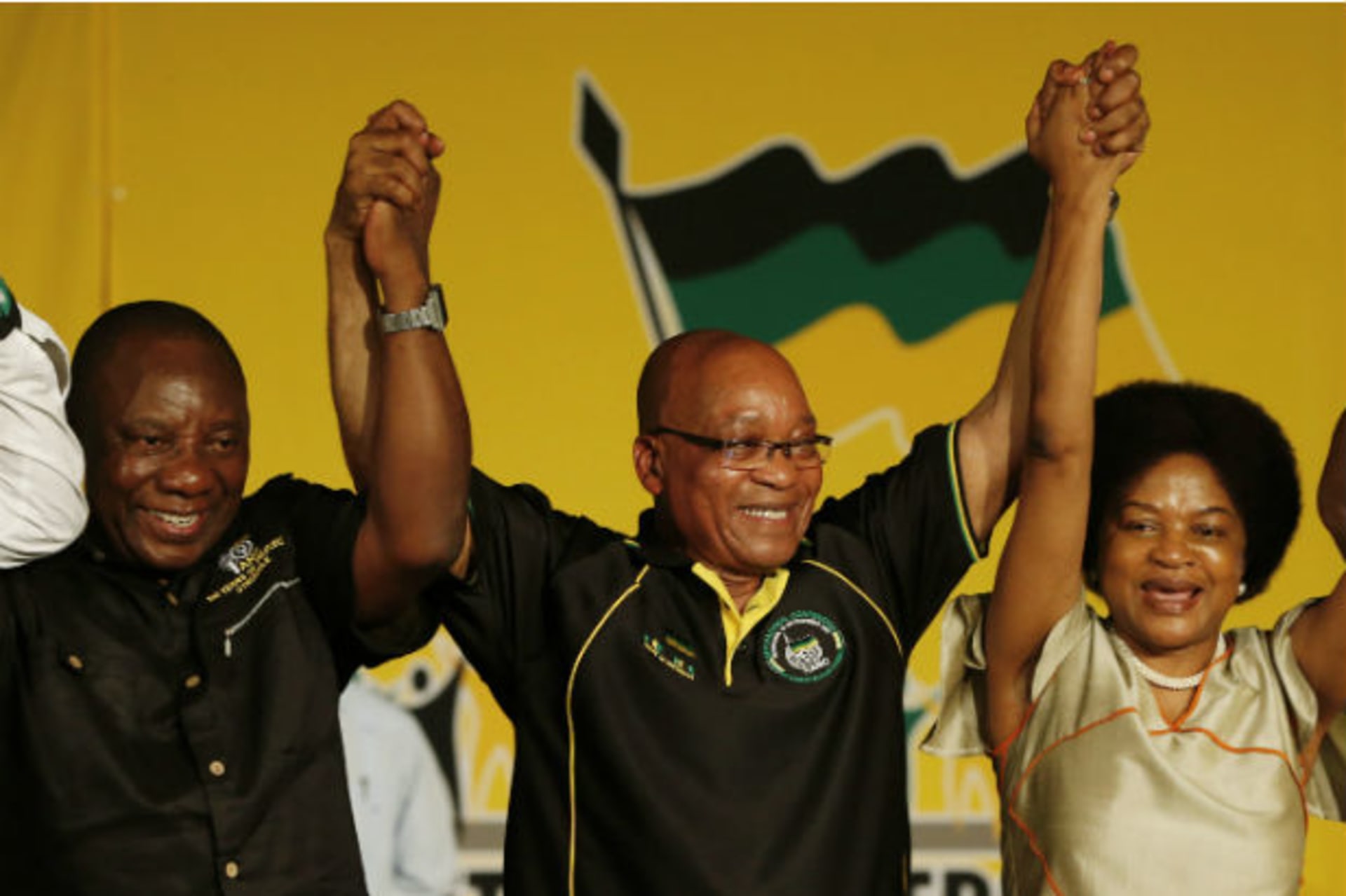 South Africa's President Zuma celebrates his re-election as party President alongside newly-elected party Deputy President Ramaphosa and re-elected Chairperson Mbete at the National Conference of the ruling African National Congress (ANC) in B