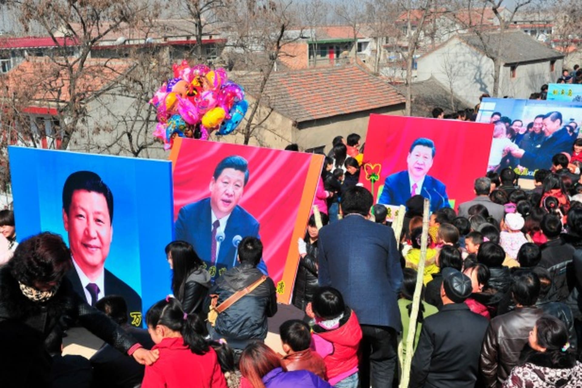 <p>Residents hold posters of the newly appointed chief of China’s Communist Party Xi Jinping and the disputed islands, known as D… to the Chinese zodiac. REUTERS/Stringer (CHINA – Tags: SOCIETY POLITICS) CHINA OUT. NO COMMERCIAL OR EDITORIAL SALES IN CHINA</p>
