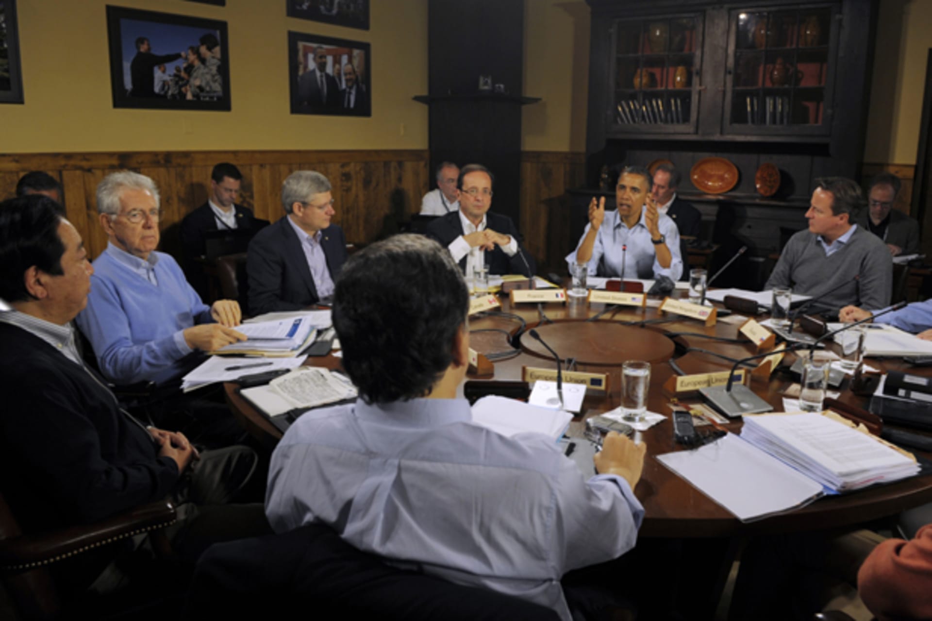 U.S. President Barack Obama (2nd R) speaks to fellow G8 heads of state at the start of the first working session of the G8 Summit at Camp David