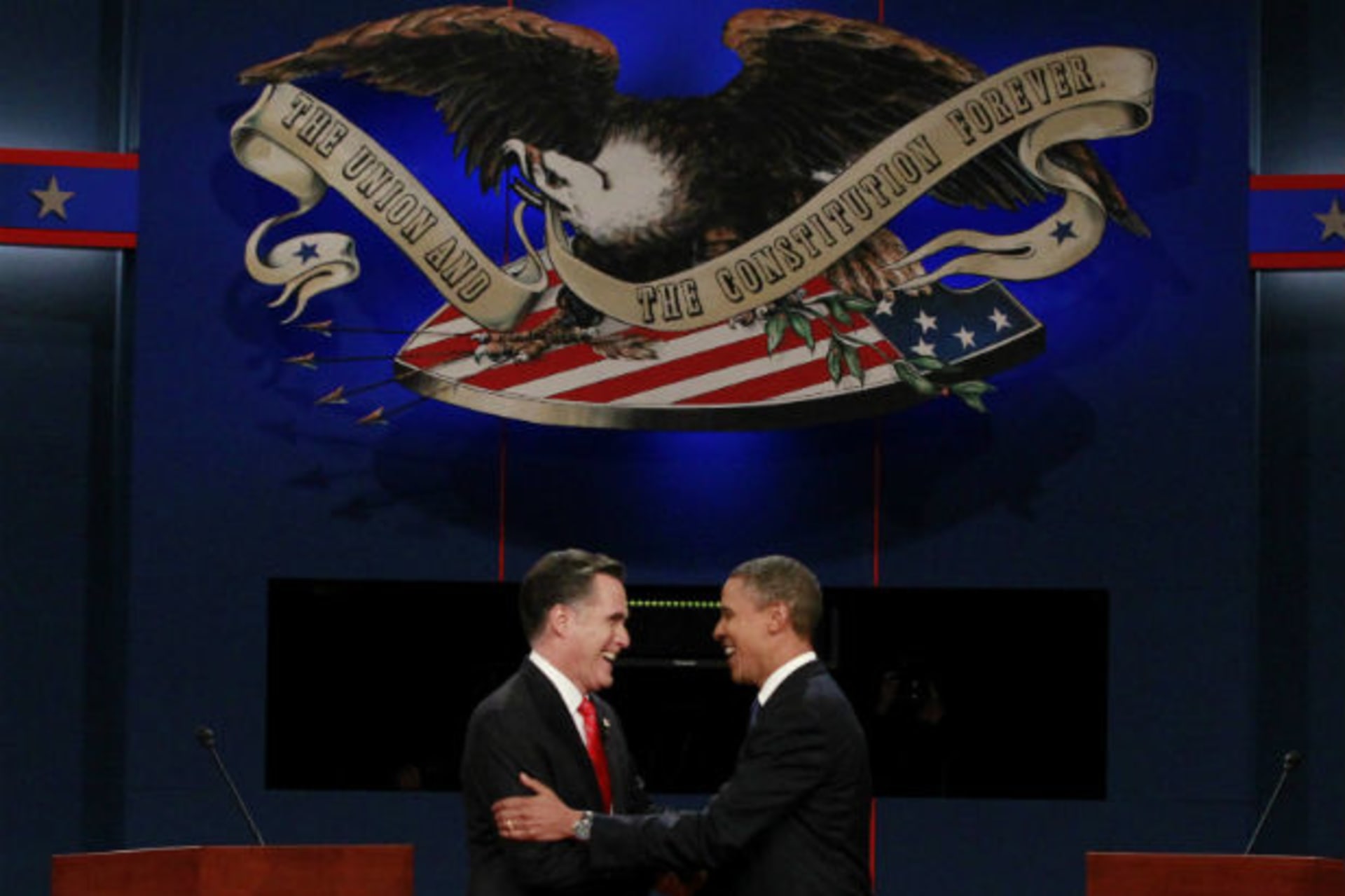 Republican presidential nominee Romney shakes hands with President Obama at the start of the first U.S. presidential debate on October 3, 2012 (Reed/Courtesy Reuters).