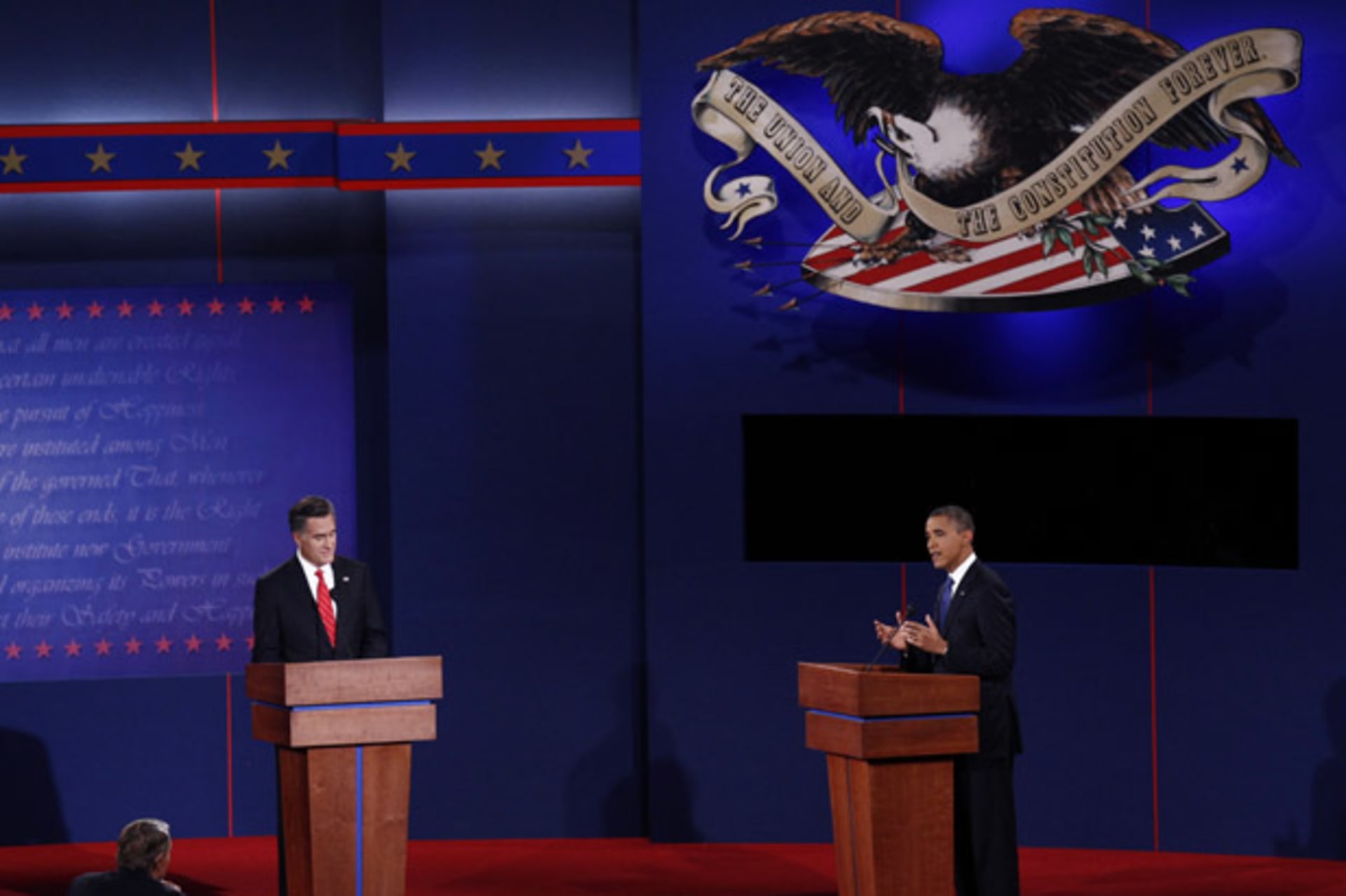 <p>Mitt Romney and Barack Obama debate in Denver on October 3, 2012. (Kevin Lamarque/ courtesy Reuters)</p>