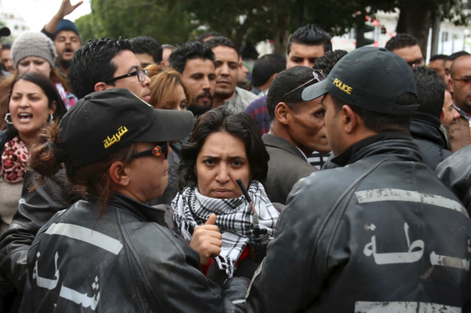 <p>An unemployed graduate clashes with riot police during a demonstration to demand the government provide them with job opportunities in Tunis (Zoubeir Souissi/Reuters).</p>
