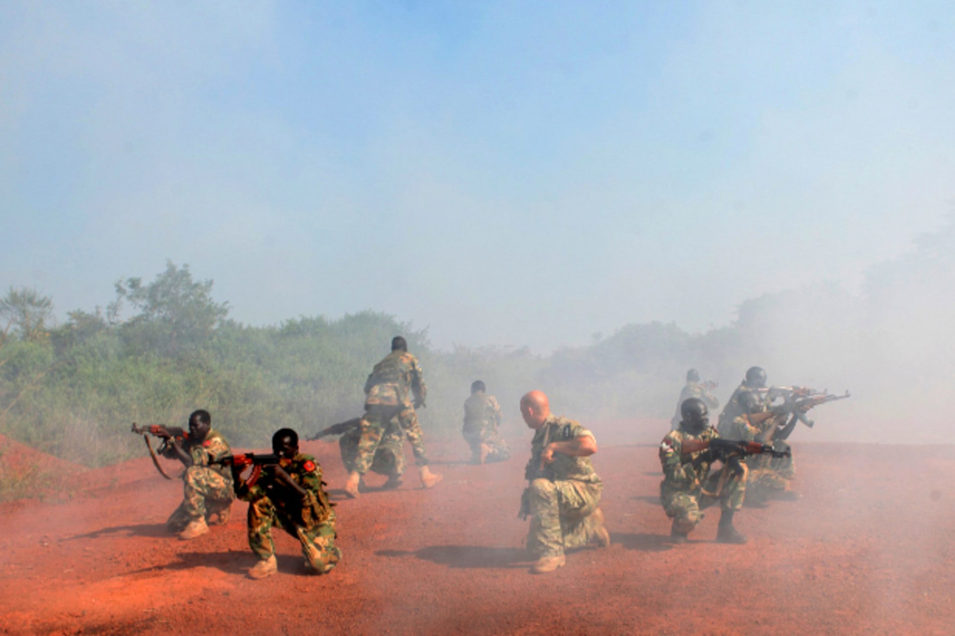 A U.S. Special Forces trainer supervises a military assault drill for a unit within the Sudan People's Liberation Army (SPLA) conducted in Nzara on the outskirts of Yambio November 29, 2013.