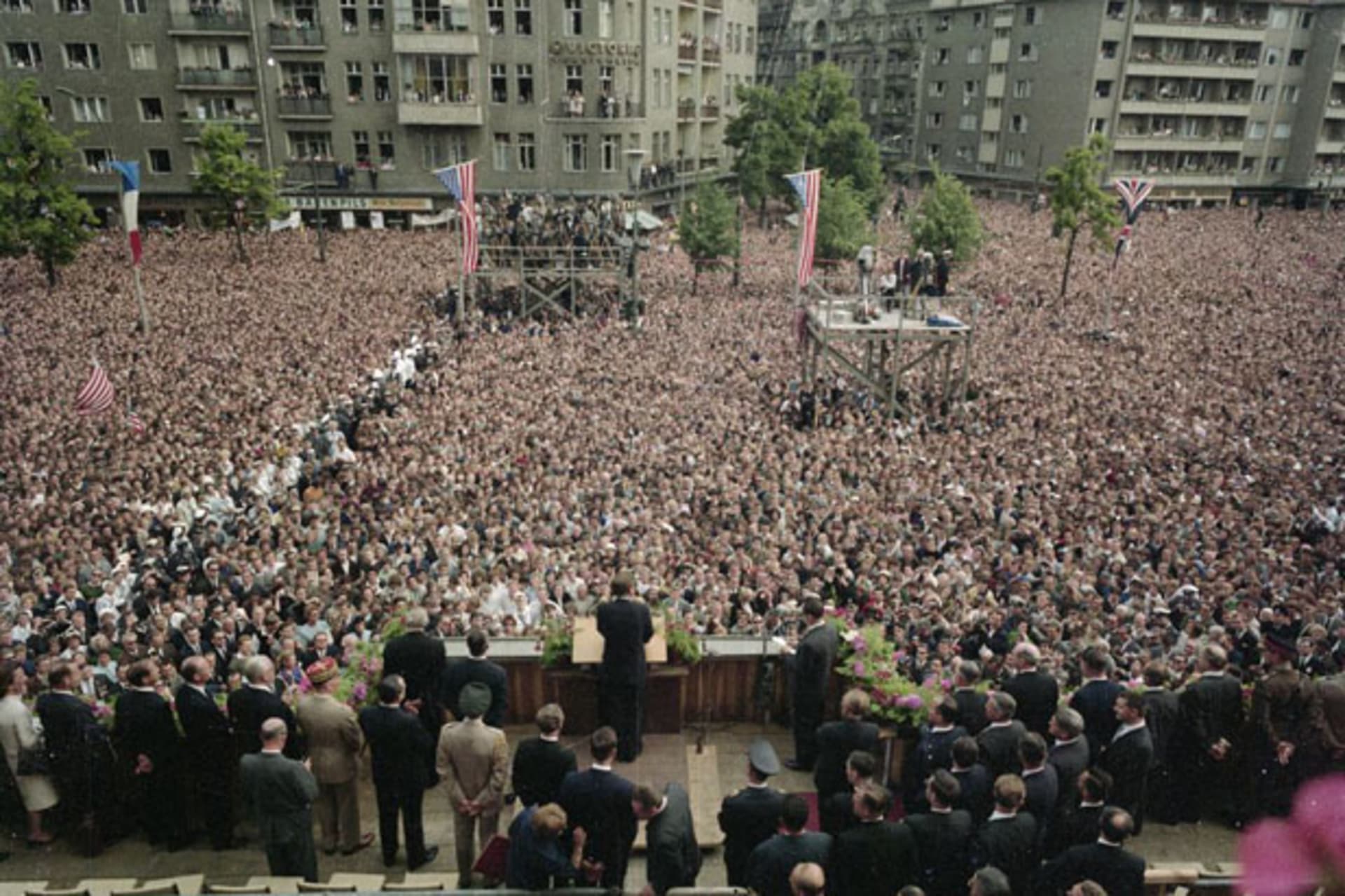 <p>A crowd watches President Kennedy as he delivers his “Ich bin ein Berliner” speech at Rudolph Wilde Platz in West Berlin (Robert Knudsen. White House Photographs. John F. Kennedy Presidential Library and Museum, Boston).</p>
