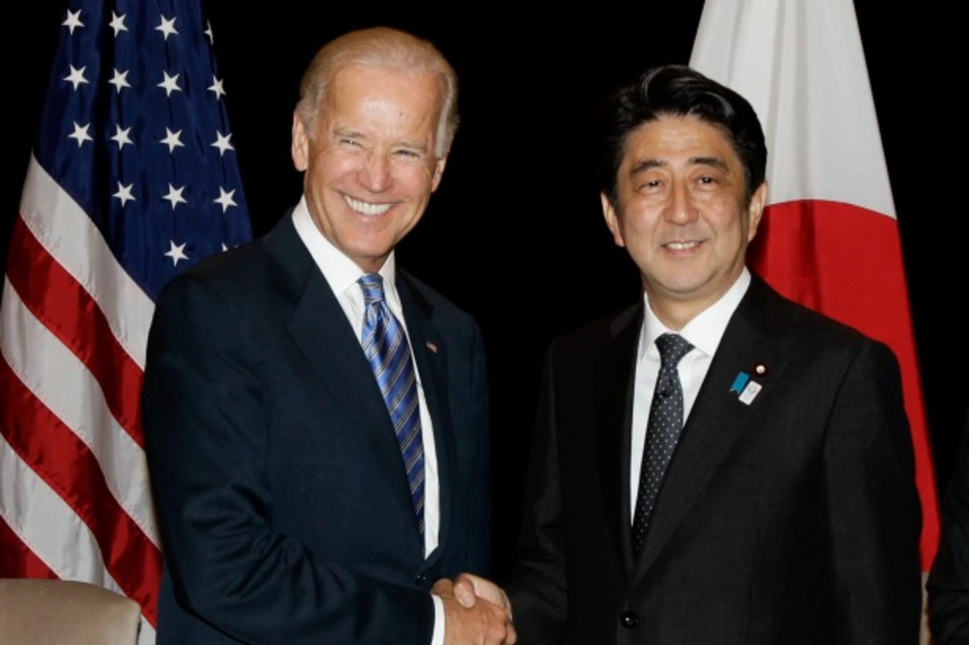 <p>U.S. Vice President Joe Biden shakes hands with Japan’s Prime Minister Shinzo Abe (R) during their bilateral meeting in Singapore on July 26, 2013 (Tim Chong/Courtesy Reuters).</p>
