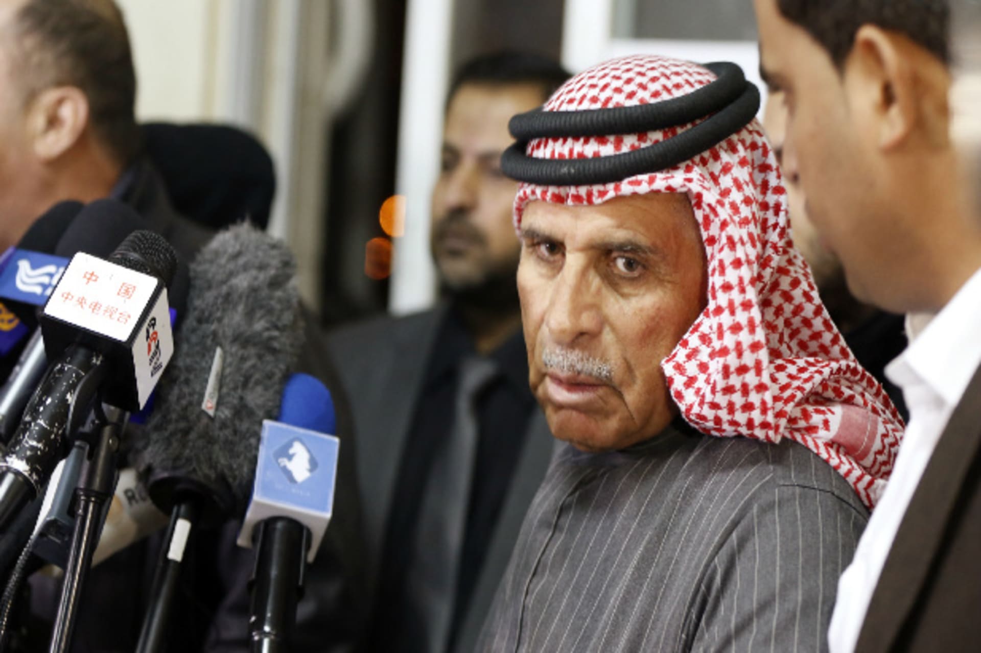 Safi Yousef (2nd R), father of Islamic State captive Jordanian pilot Muath al-Kasaesbeh, speaks at a news conference where he asked for Islamic State to pardon and release his son, in Amman January 29, 2015 (Hamed/Courtesy Reuters).