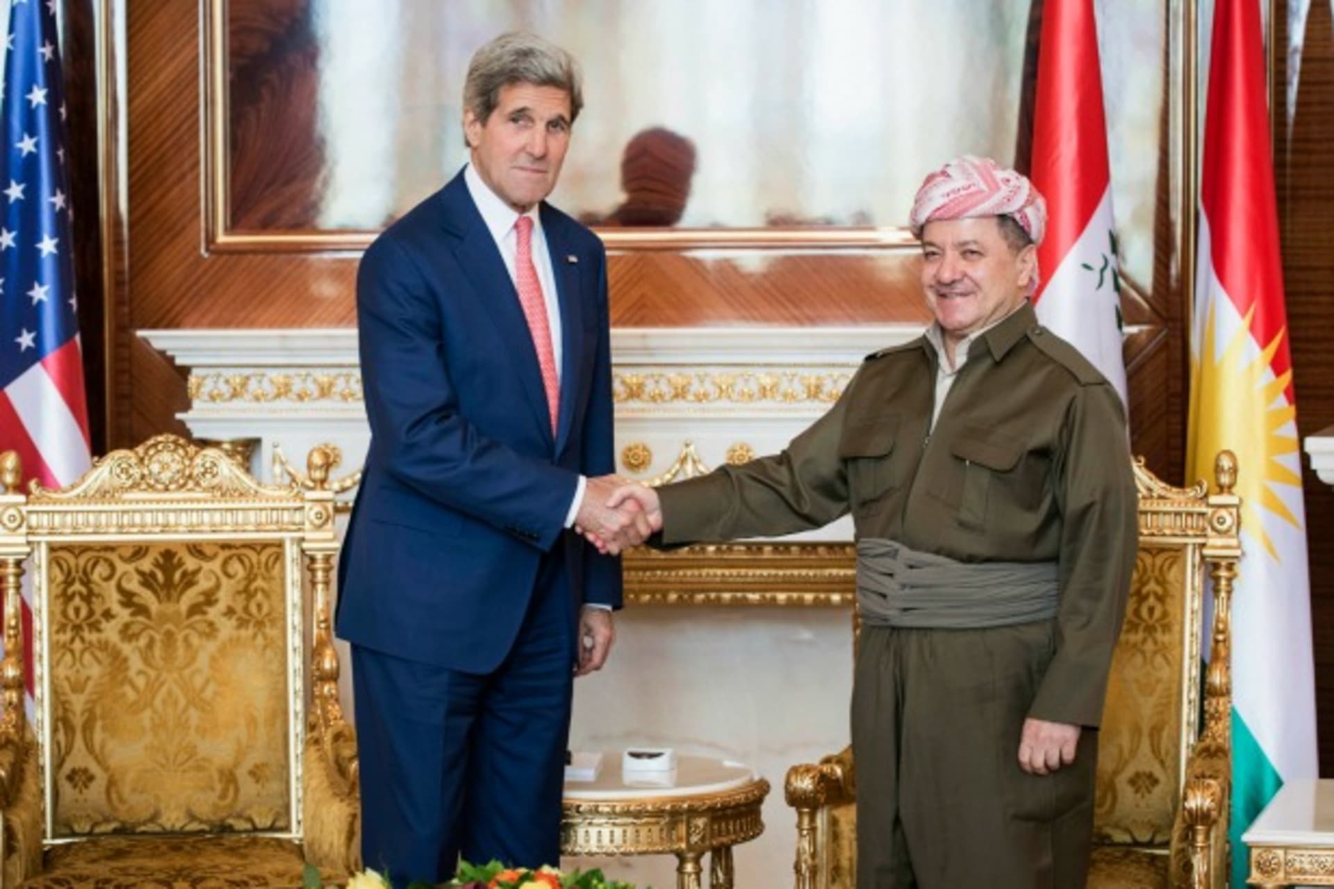 Kurdistan Regional Government President Massoud Barzani greets U.S. Secretary of State John Kerry at the presidential palace in Irbil, the capital of northern Iraq's Kurdistan autonomous region, June 24, 2014. This is the first visit to the Kur