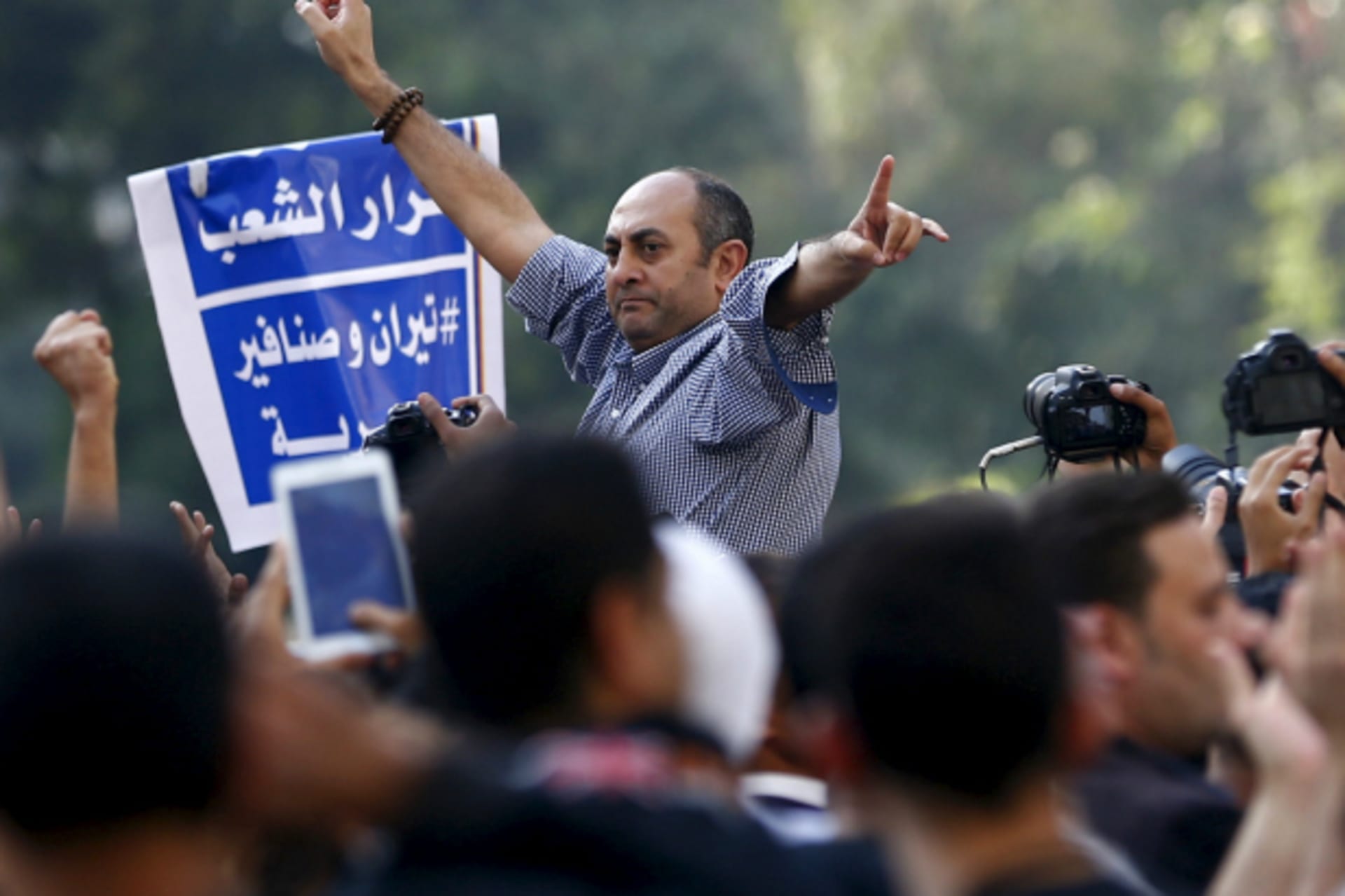 <p>Khaled Ali shouts slogans against President Abdel Fattah al-Sisi and the government during a demonstration protesting the decision to transfer two Red Sea islands to Saudi Arabia (Amr Abdallah Dalsh/Reuters).</p>
