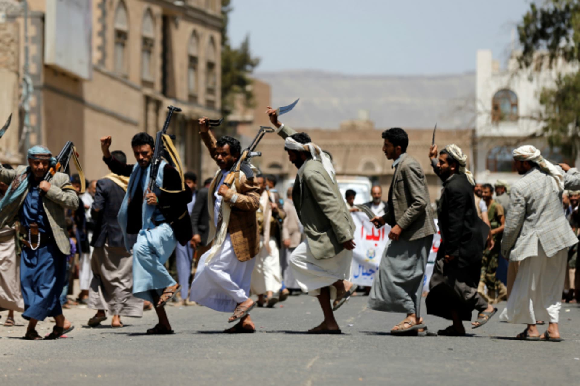 <p>Tribesmen loyal to the Houthi movement perform the Baraa dance during a gathering to show support to the movement in Sanaa, Yemen (Khaled Abdullah/Reuters).</p>