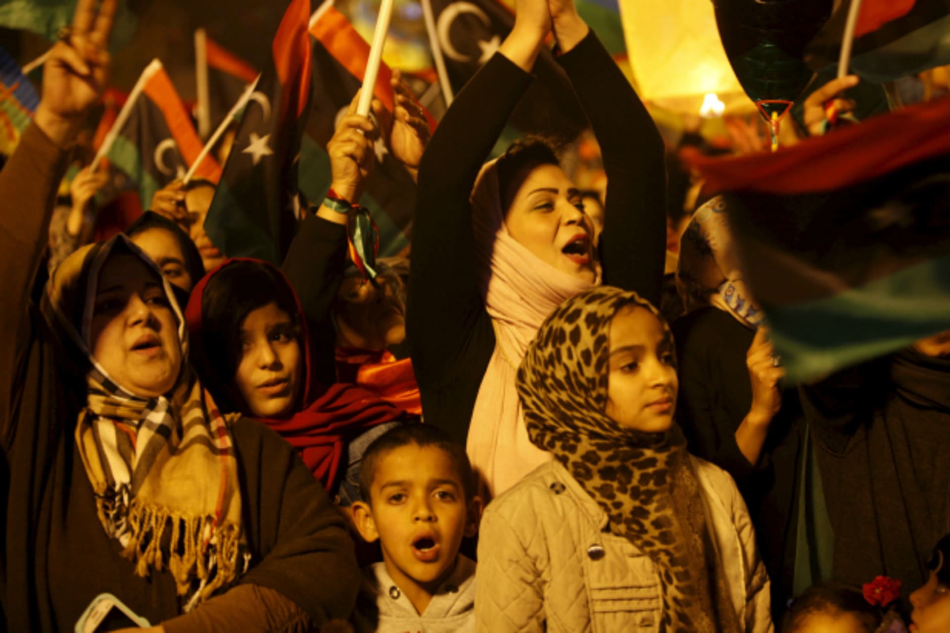 <p>Libyans celebrate the fifth anniversary of the Libyan revolution, at Martyrs’ Square in Tripoli (Ismail Zitouny/Reuters).</p>
