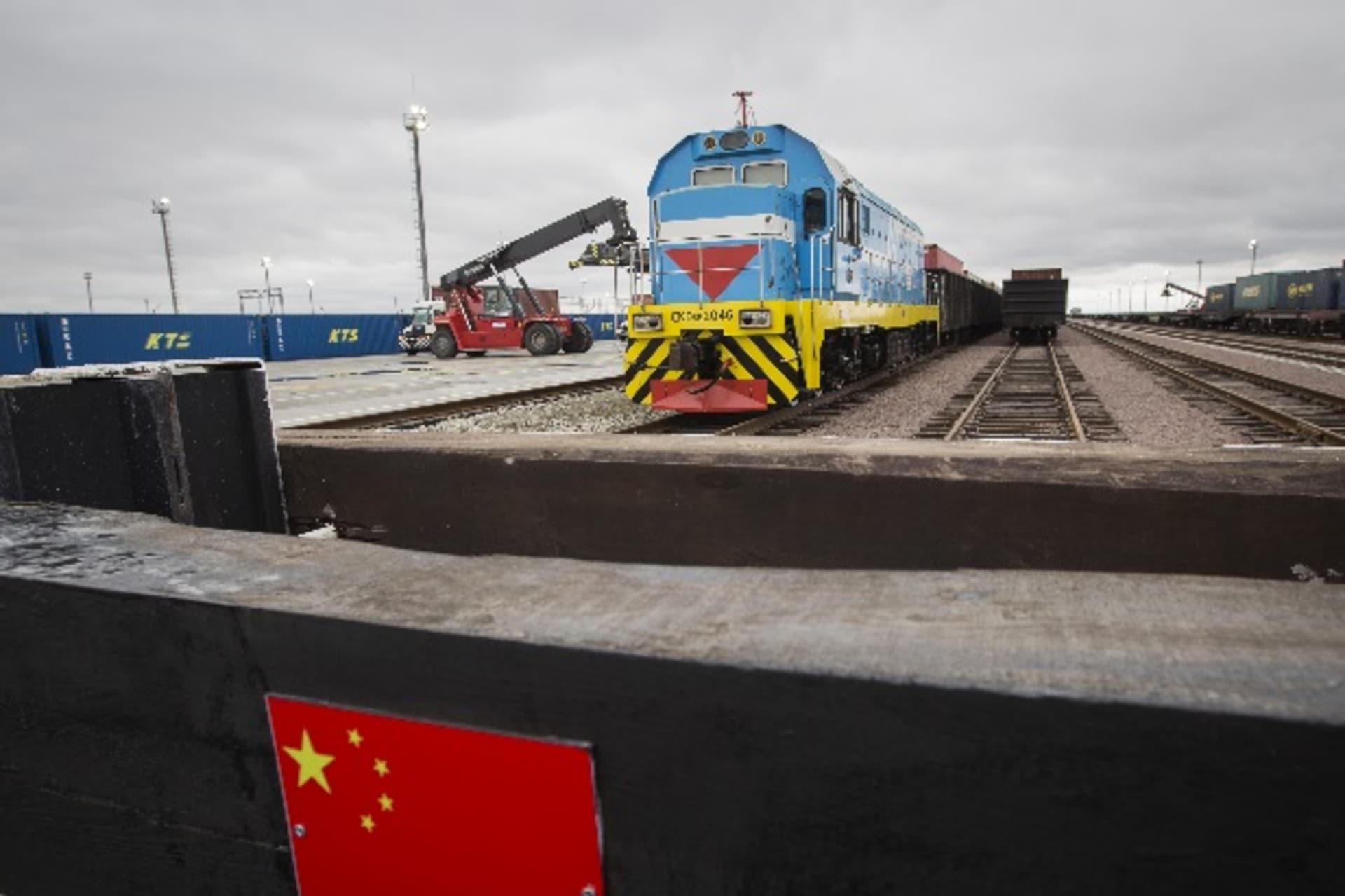 <p>A Chinese flag marking a railway linked to China is seen in front of a train at the Khorgos border crossing point, east of the…egulations that hurt its reputation as a cross-border trading partner. Picture taken October 19, 2015. REUTERS/Shamil Zhumatov</p>

