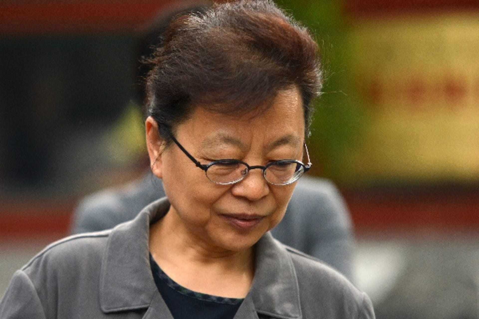 <p>Lu Xiwen is seen on her way to work in Beijing, May 13, 2014. Lu, a deputy Communist Party boss in Beijing, and the vice mayor…reaches of discipline”, the party said, using its usual euphemism for corruption. Picture taken May 13, 2014. REUTERS/Stringer</p>

