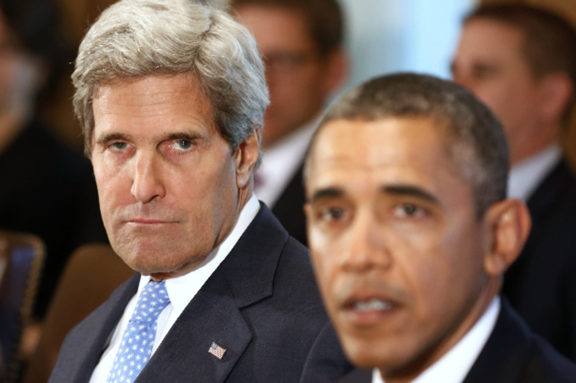U.S. secretary of state John Kerry listens to U.S. president Barack Obama (Downing/Courtesy Reuters).