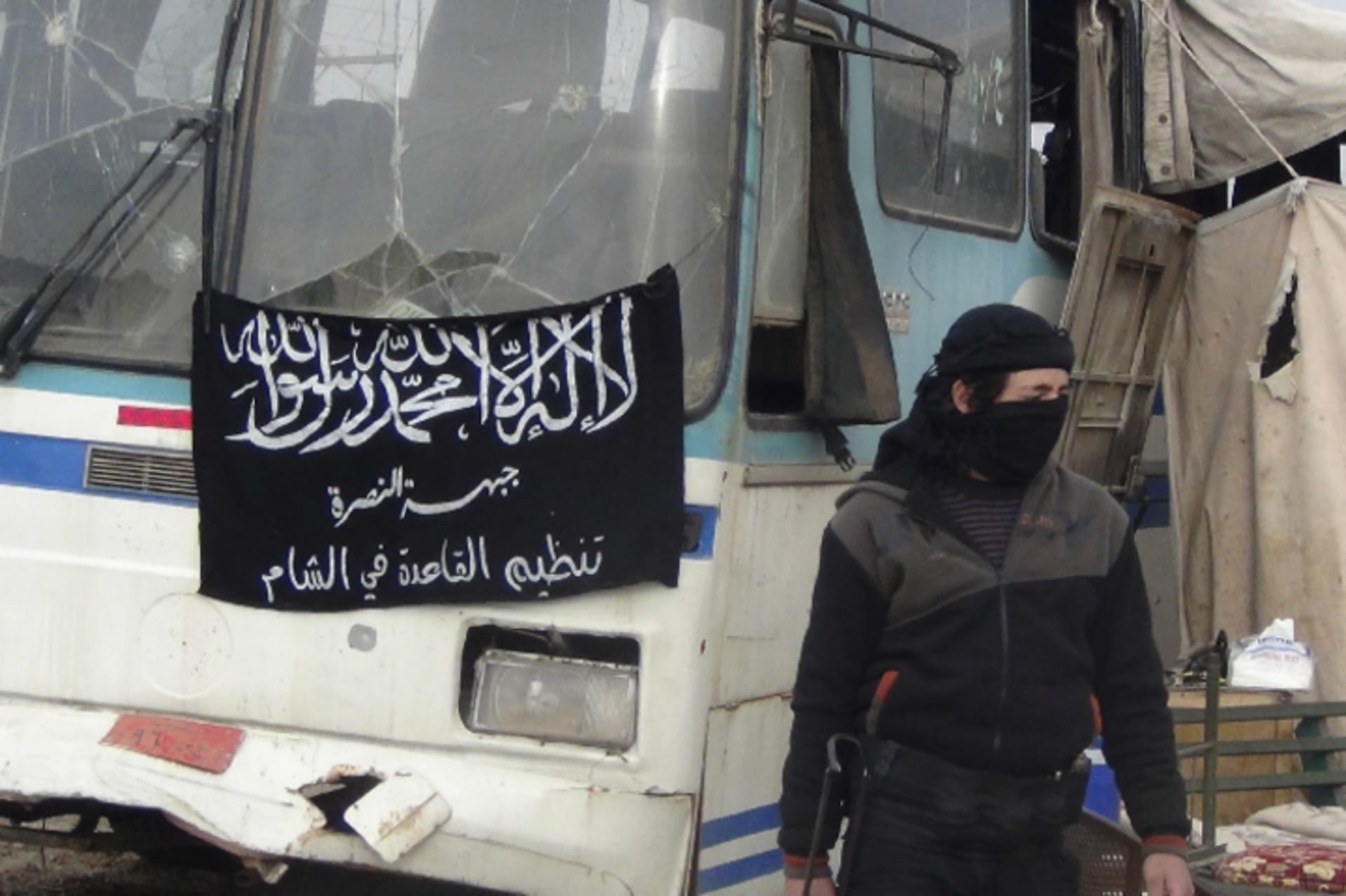 A member of Islamist Syrian rebel group Jabhat al-Nusra mans a checkpoint on the border crossing between Syria and Jordan, which they claim to have taken control of, in Daraa December 26, 2013 (Khassawneh/Courtesy Reuters).
