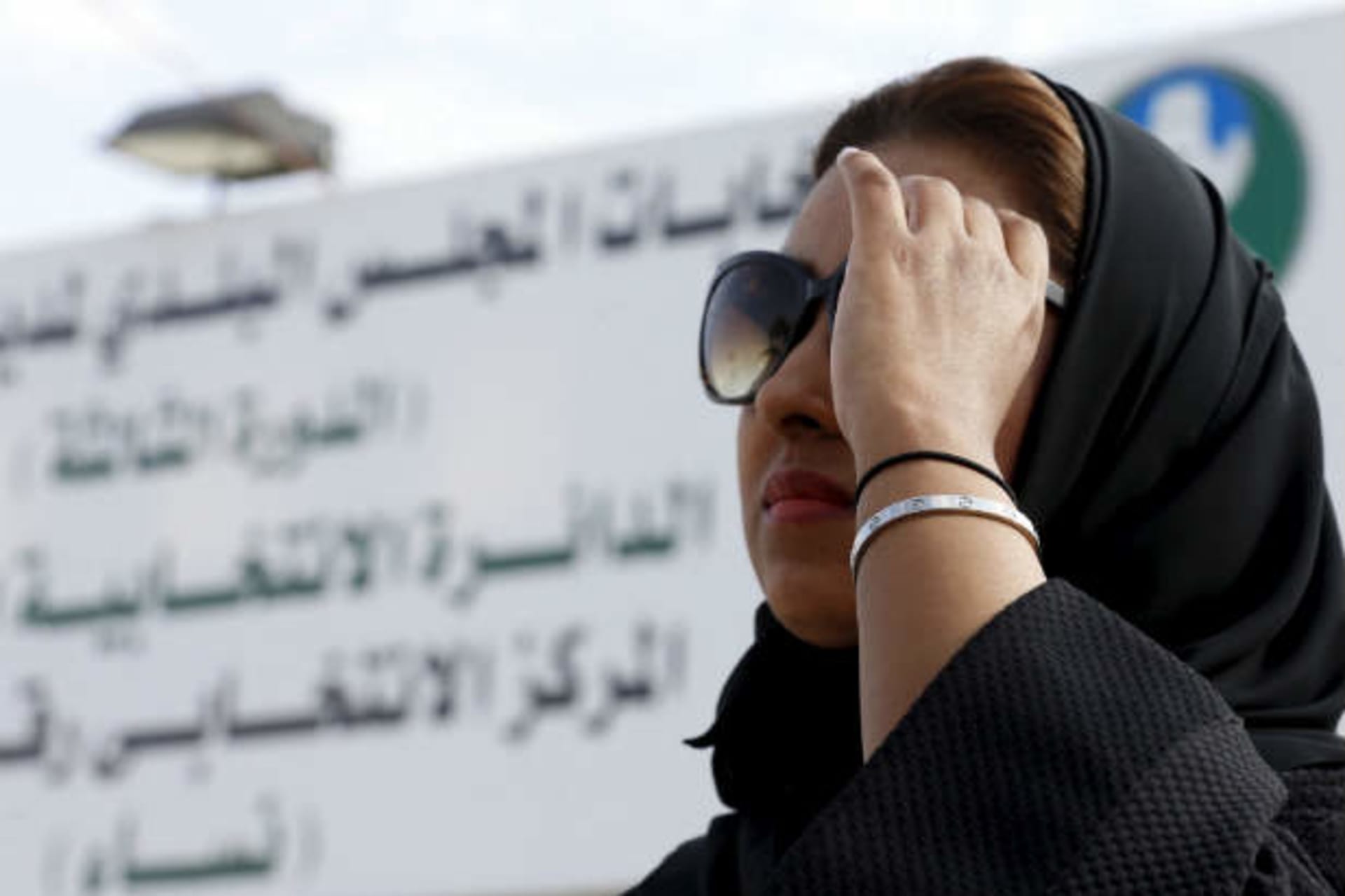 <p>Saudi-women-elections-poll-woman</p>