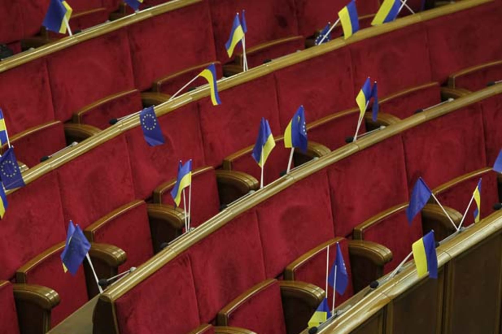 <p>Ukrainian and EU flags are displayed before a session of the Ukrainian parliament in Kiev on November 21, 2013 (Gleb Garanich/Courtesy Reuters).</p>
