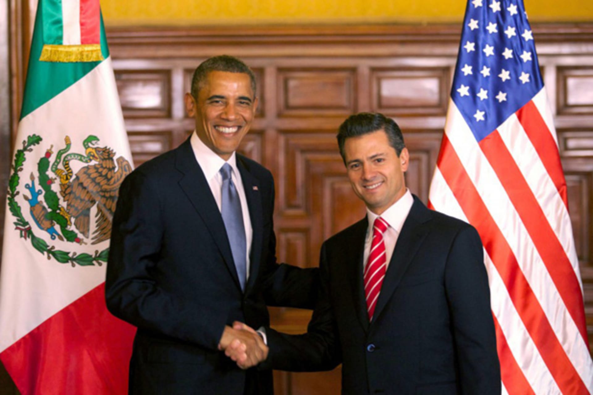 <p>U.S. president Barack Obama and his Mexican counterpart Enrique Pena Nieto shake hands in Mexico City in May 2013. (Mexico Presidency Handout/Courtesy Reuters)</p>
