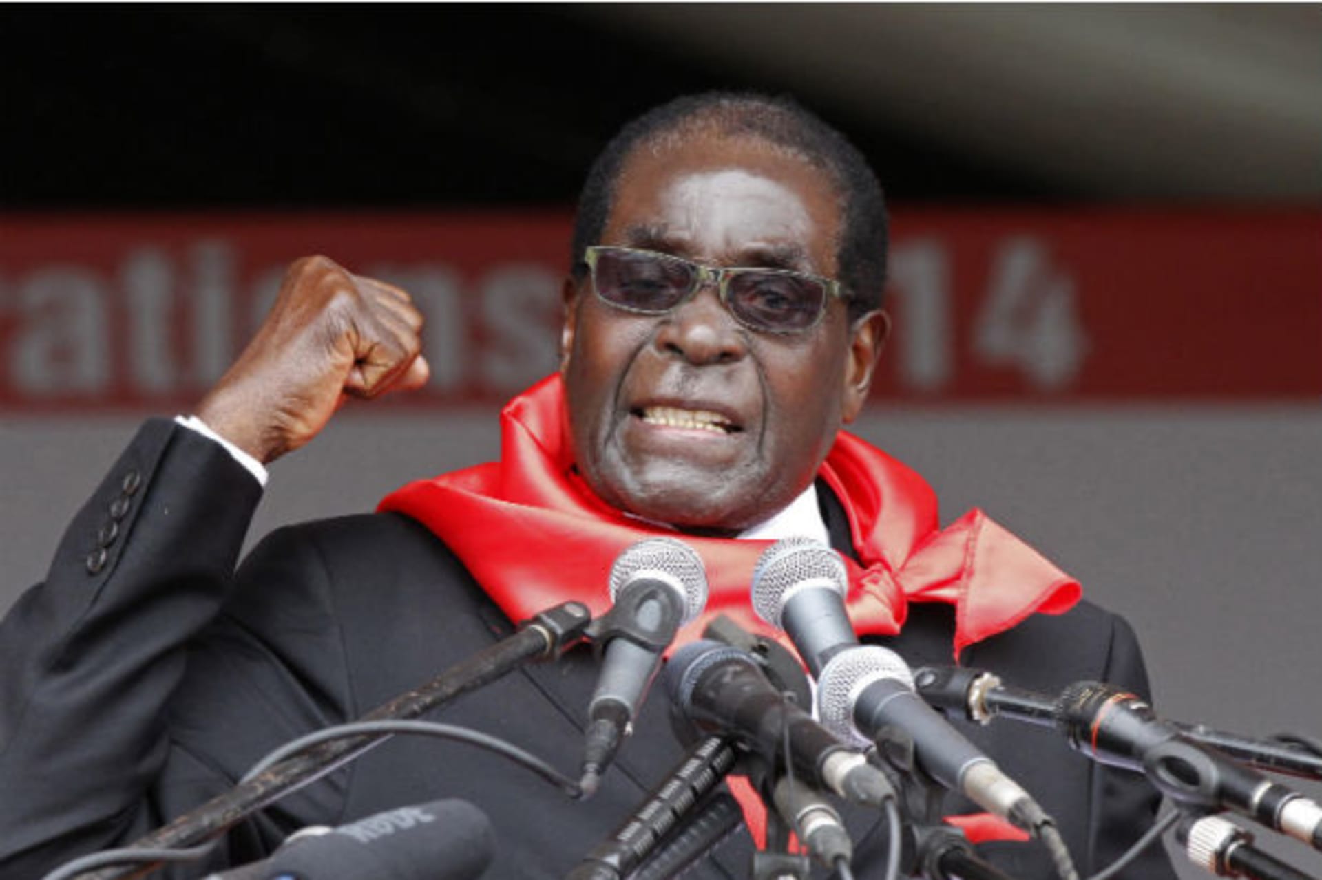 Zimbabwe President Robert Mugabe addresses supporters during celebrations to mark his 90th birthday in Marondera about 80km ( 50 miles) east of the capital Harare, February 23, 2014.