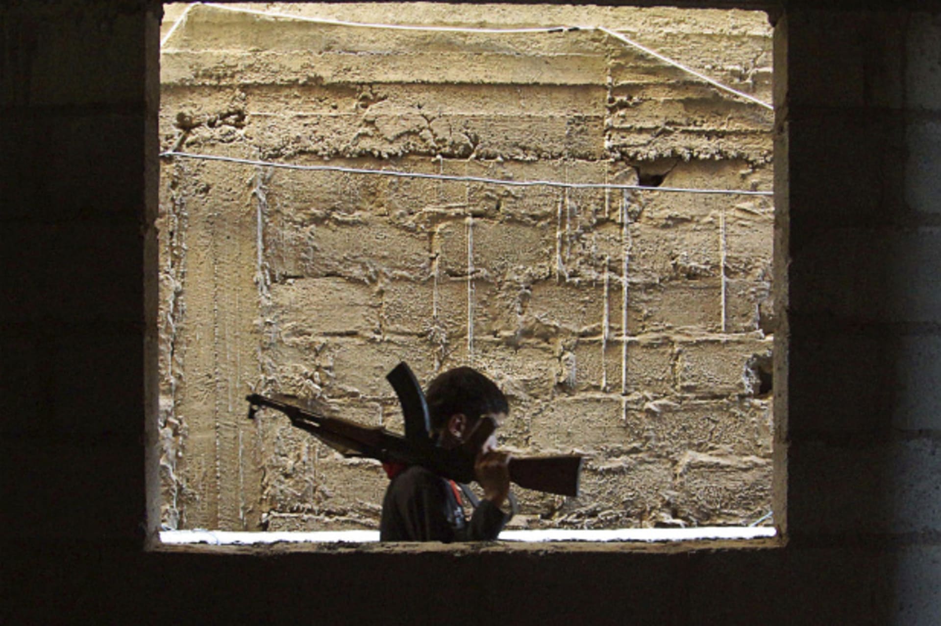 <p>14-year-old Syrian fighter</p>
