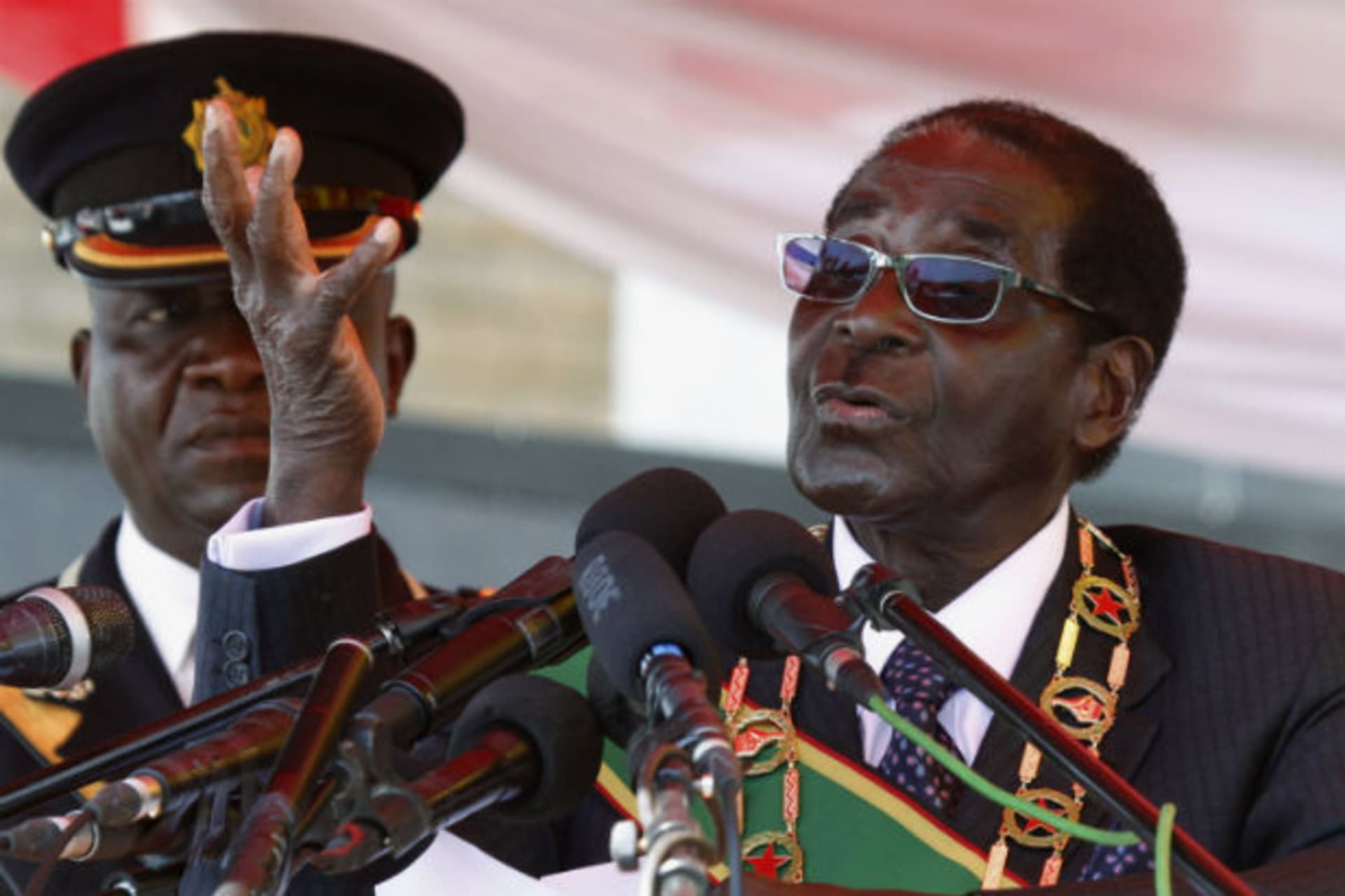 Zimbabwe's President Robert Mugabe addresses the crowd gathered to commemorate Heroes Day in Harare August 12, 2013.