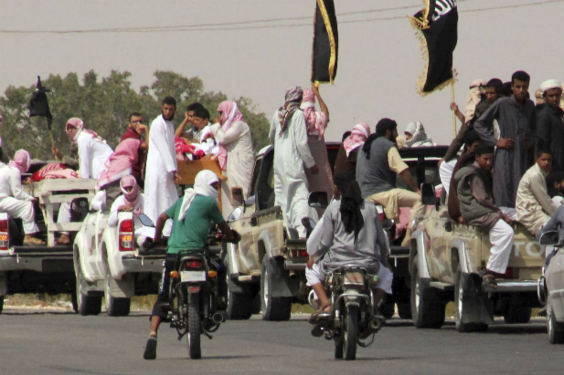 <p>funeral convoy carrying bodies of four Islamist militants killed by an air strike</p>
