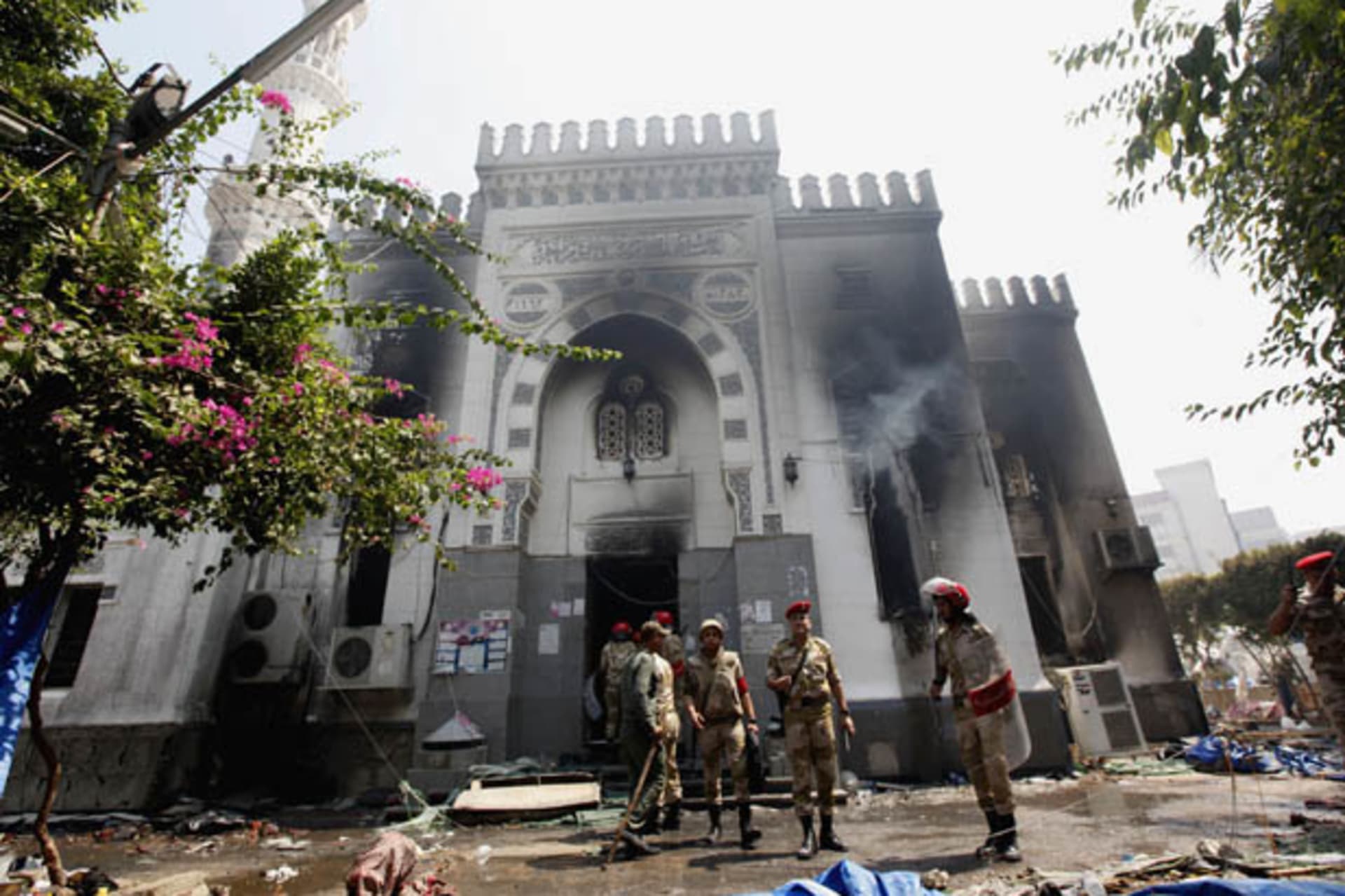 <p>Military police stand outside the Rabaa Adawiya mosque in Cairo on August 15 (Mohamed Abd El Ghany/ Courtesy Reuters).</p>