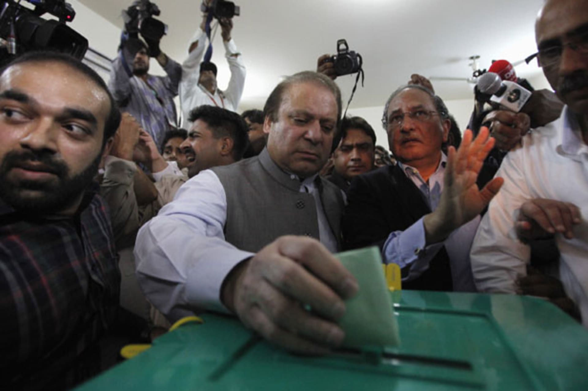 <p>Nawaz Sharif casts his vote in Pakistan’s May 11 general election (Mohsin Raza/Courtesy Reuters).</p>