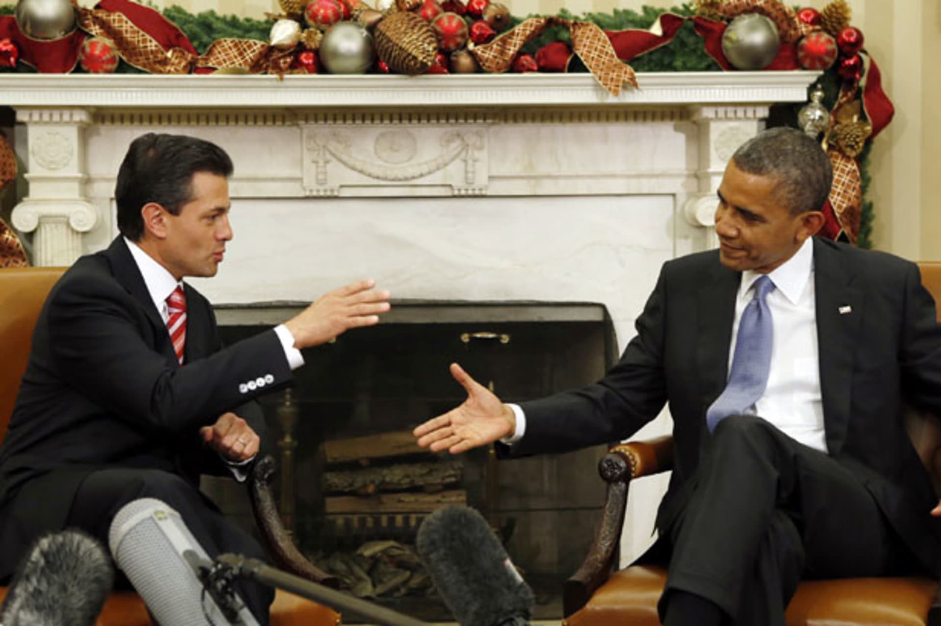 <p>Barack Obama meets with Mexican president-elect Enrique Pena Nieto in the Oval Office in November (Kevin Lamarque/Courtesy Reuters).</p>