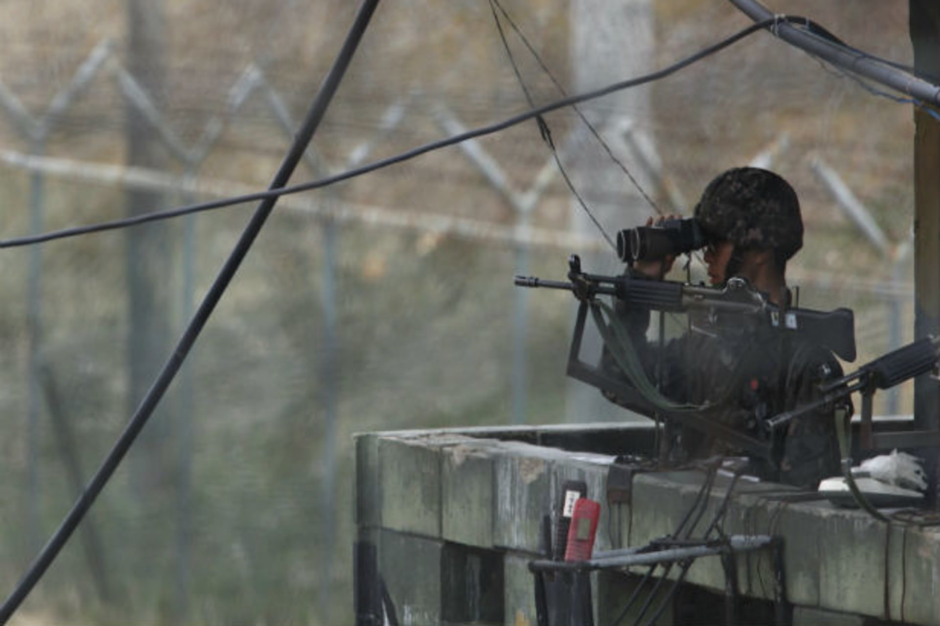 <p>A South Korean soldier looks to the north near the demilitarized zone. (Kim Hong-Ji/Courtesy Reuters).</p>

