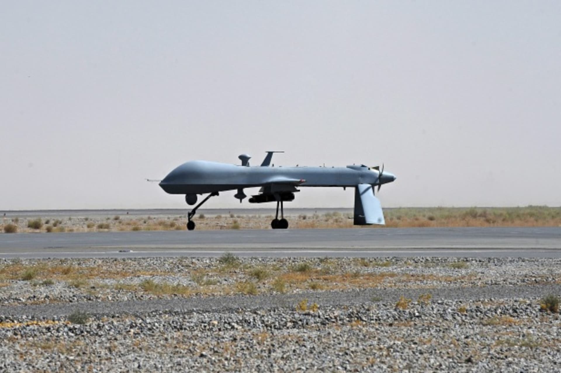 <p>An armed drone prepares to take off in Afghanistan (Handout/Courtesy Reuters).</p>
