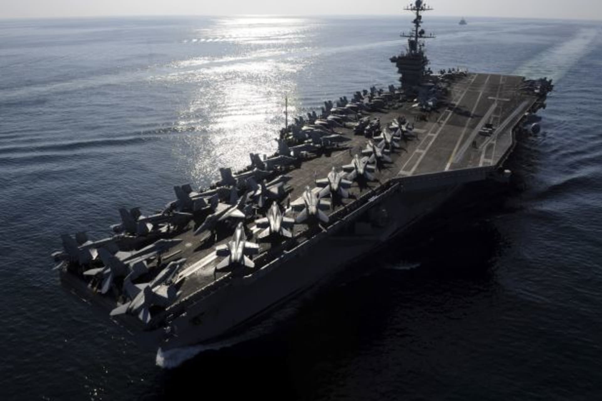 <p>The aircraft carrier USS John C. Stennis transits the Straits of Hormuz (Handout/Courtesy Reuters).</p>
