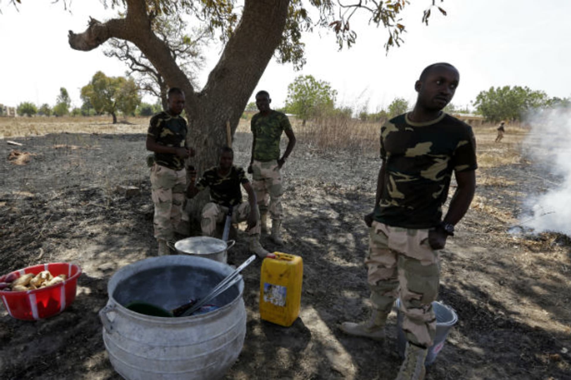 Bamako, Mali Nigerian soldiers prepare to cook at the Mali air force base near Bamako as troops await their deployment January 19, 2013.
