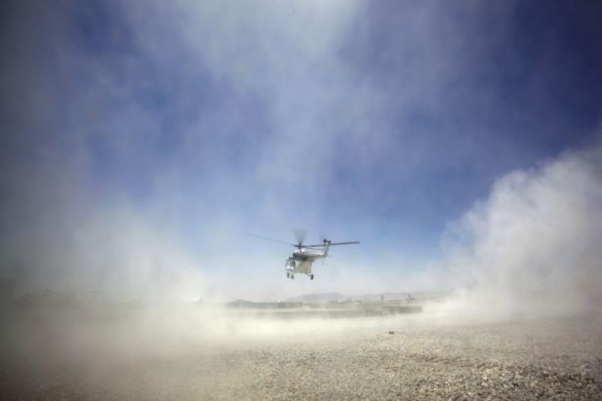 <p>A helicopter lands at Forward Operating Base Apache in the Zabul Province of Afghanistan (Tim Wimborne/Courtesy Reuters).</p>
