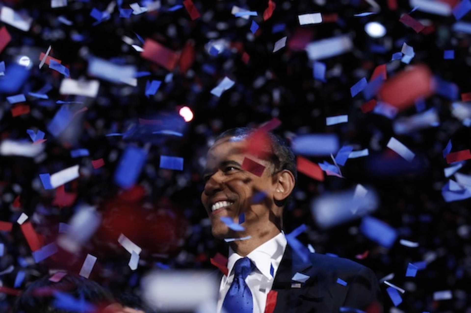 <p>U.S. president Barack Obama celebrates on stage as confetti falls after his victory speech during his election rally in Chicago, November 6, 2012 (Kevin Lamarque/Courtesy Reuters).</p>
