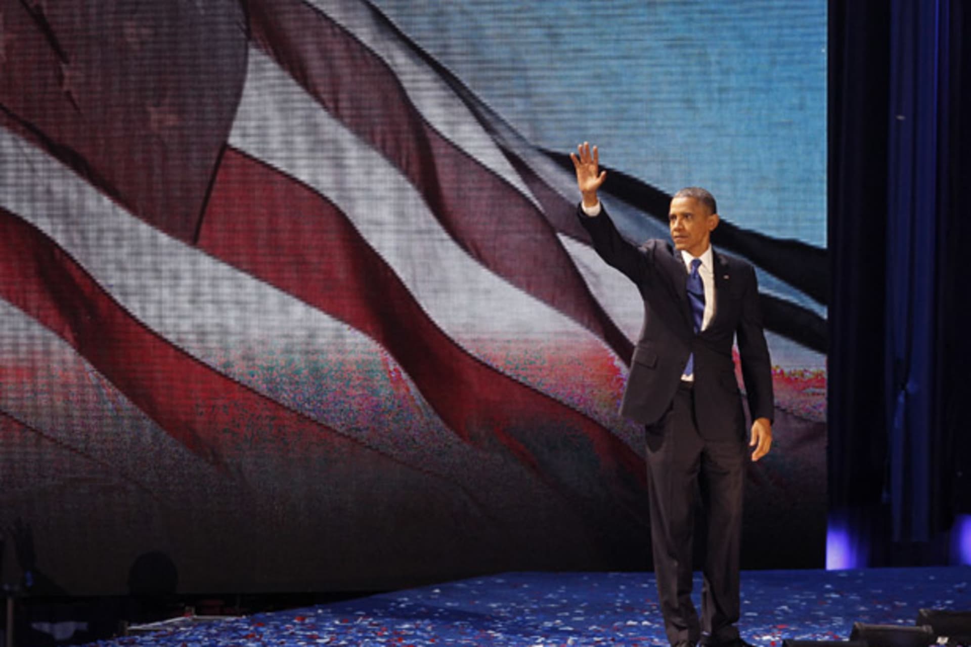 <p>President Barack Obama waves to the crowd of supporters in Chicago after winning the 2012 U.S. presidential election (Jim Bourg/Courtesy Reuters).</p>