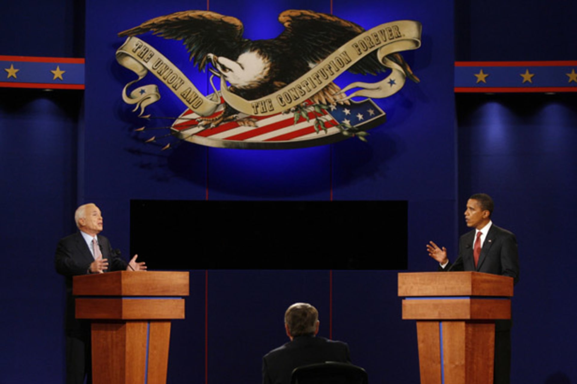 <p>John McCain and Barack Obama debate foreign policy at the University of Mississippi in 2008. (Jim Bourg/ courtesy Reuters)</p>
