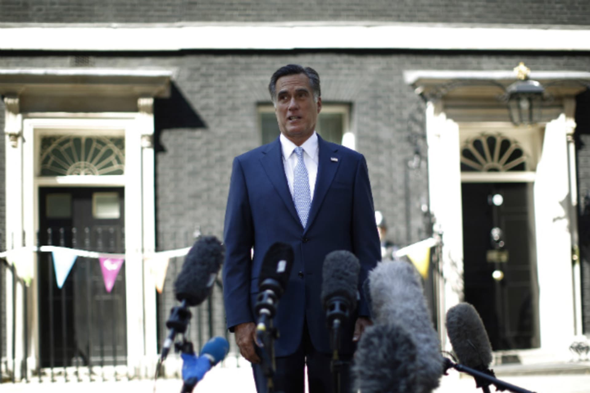 <p>Mitt Romney speaks to the press following a meeting with British prime minister David Cameron and British chancellor of the exchequer George Osborne outside 10 Downing Street in London. (Jason Reed/courtesy Reuters)</p>
