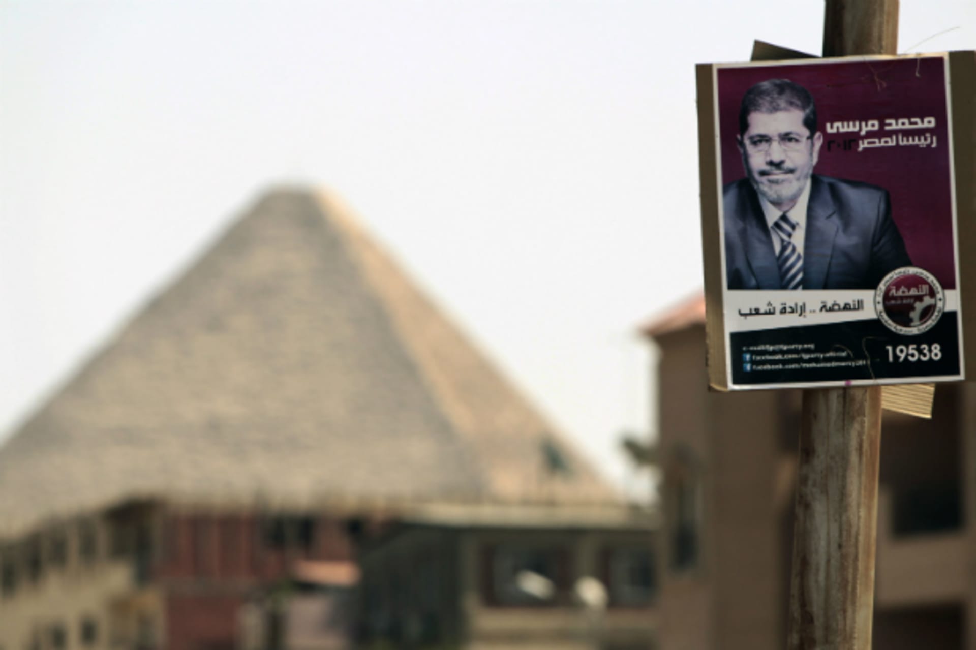 <p>A campaign poster in Cairo depicts Egyptian presidential candidate Mohammed Morsi. (Ammar Awad/courtesy Reuters)</p>

