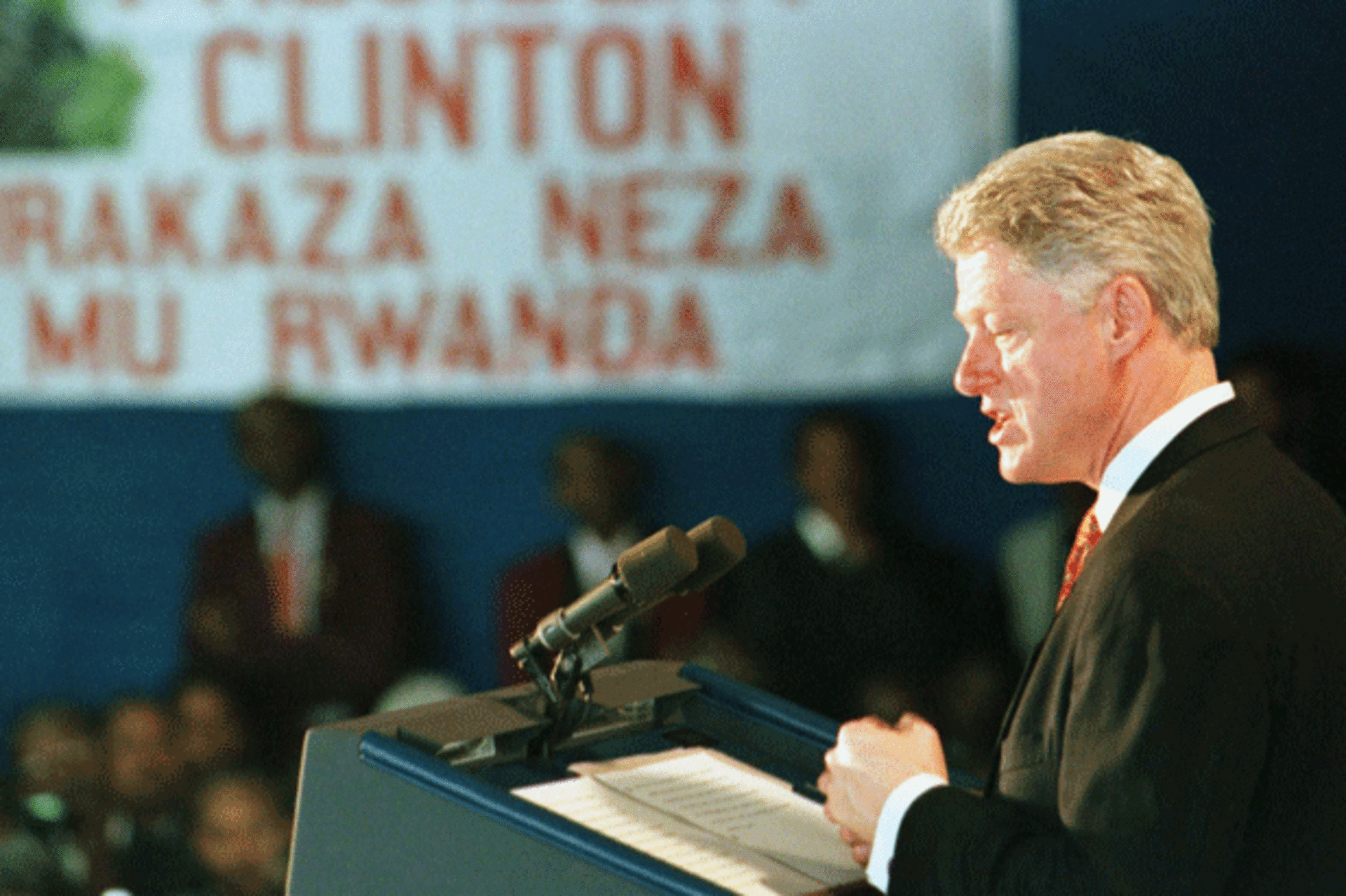 <p>President Clinton speaks to survivors of the 1994 Rwandan genocide at the Kigali airport on March 25, 1998. (Win McNamee/courtesy Reuters)</p>

