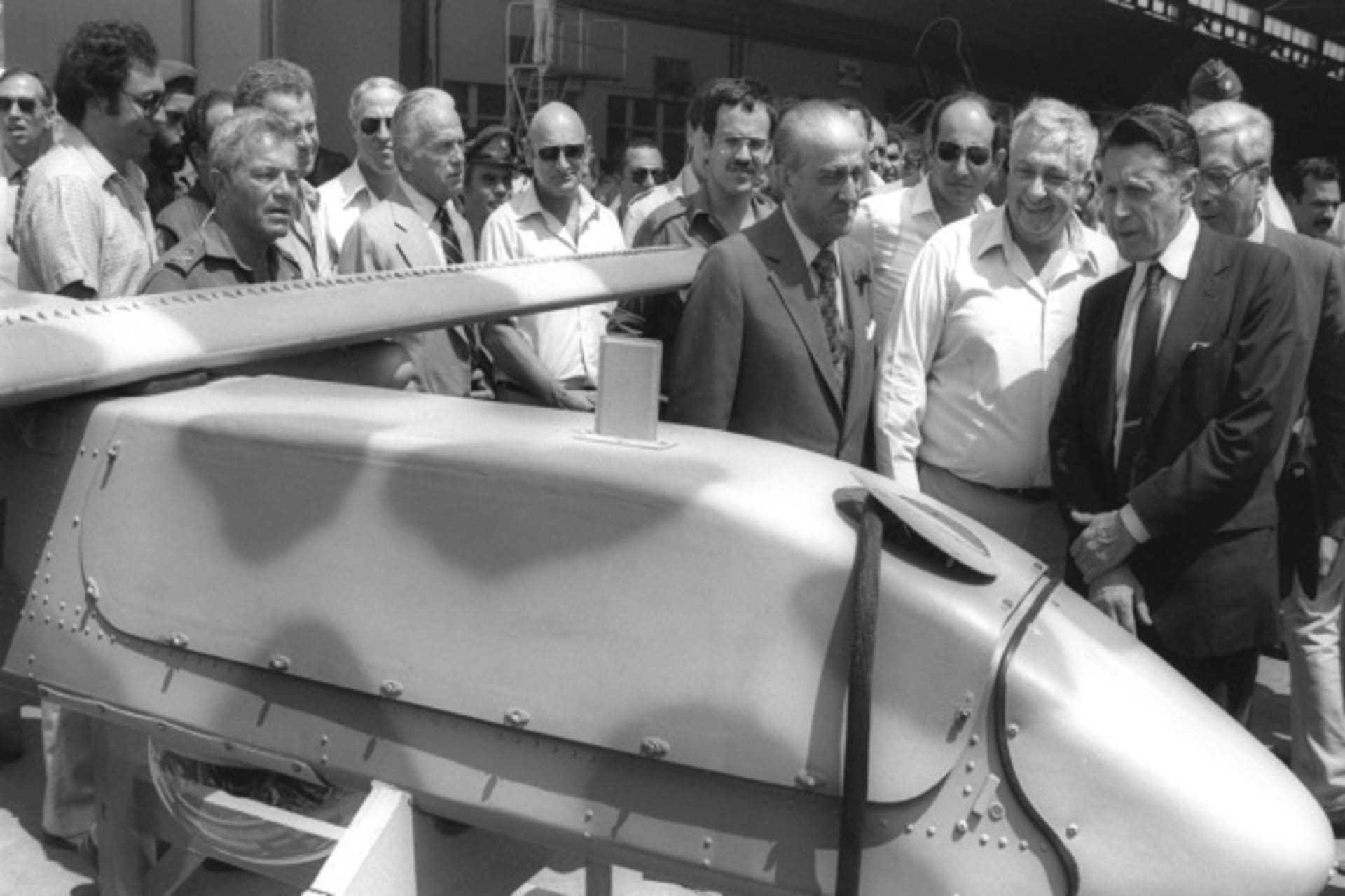 <p>U.S. secretary of defense Casper Weinberger and Israeli minister of defense Ariel Sharon inspect a pilotless airplane September 2, 1982 (Courtesy Reuters/Stringer).</p>
