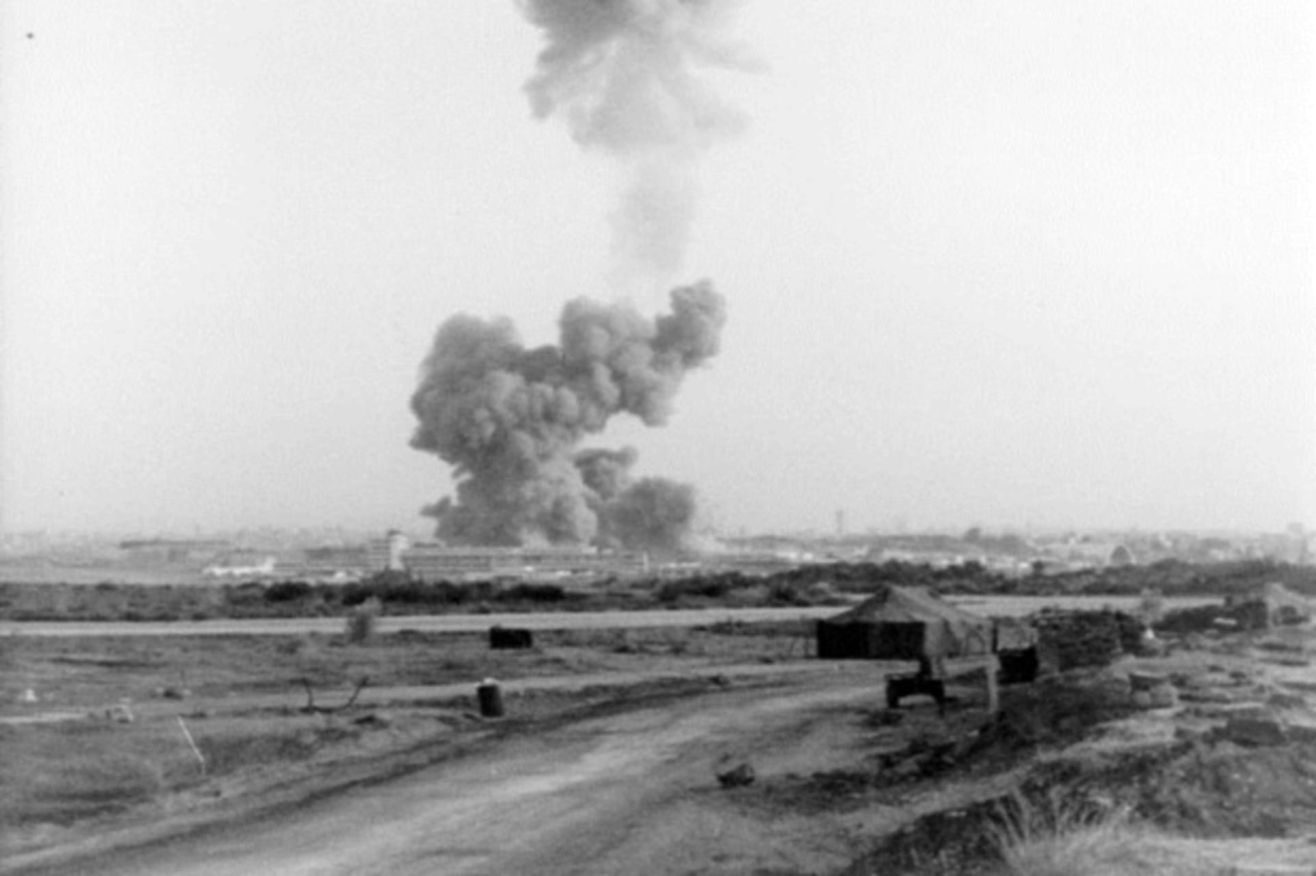 <p>Smoke rises from the bombed Marine barracks at Beirut International Airport on October 23, 1983.</p>
