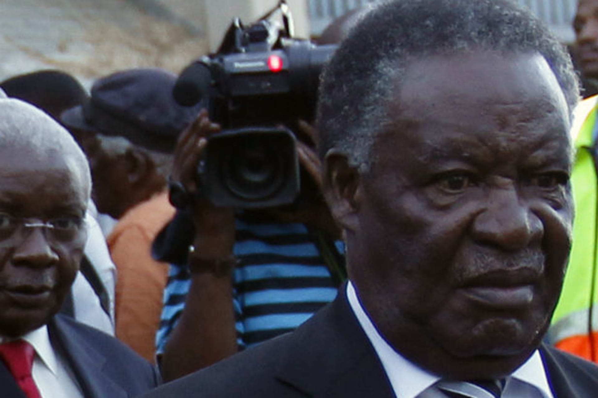 Zambia's President Michael Sata (R) arrives with Mozambique's President Armando Guebuza ahead of the upcoming African National Congress (ANC) centenary celebration in Bloemfontein January 7, 2012.