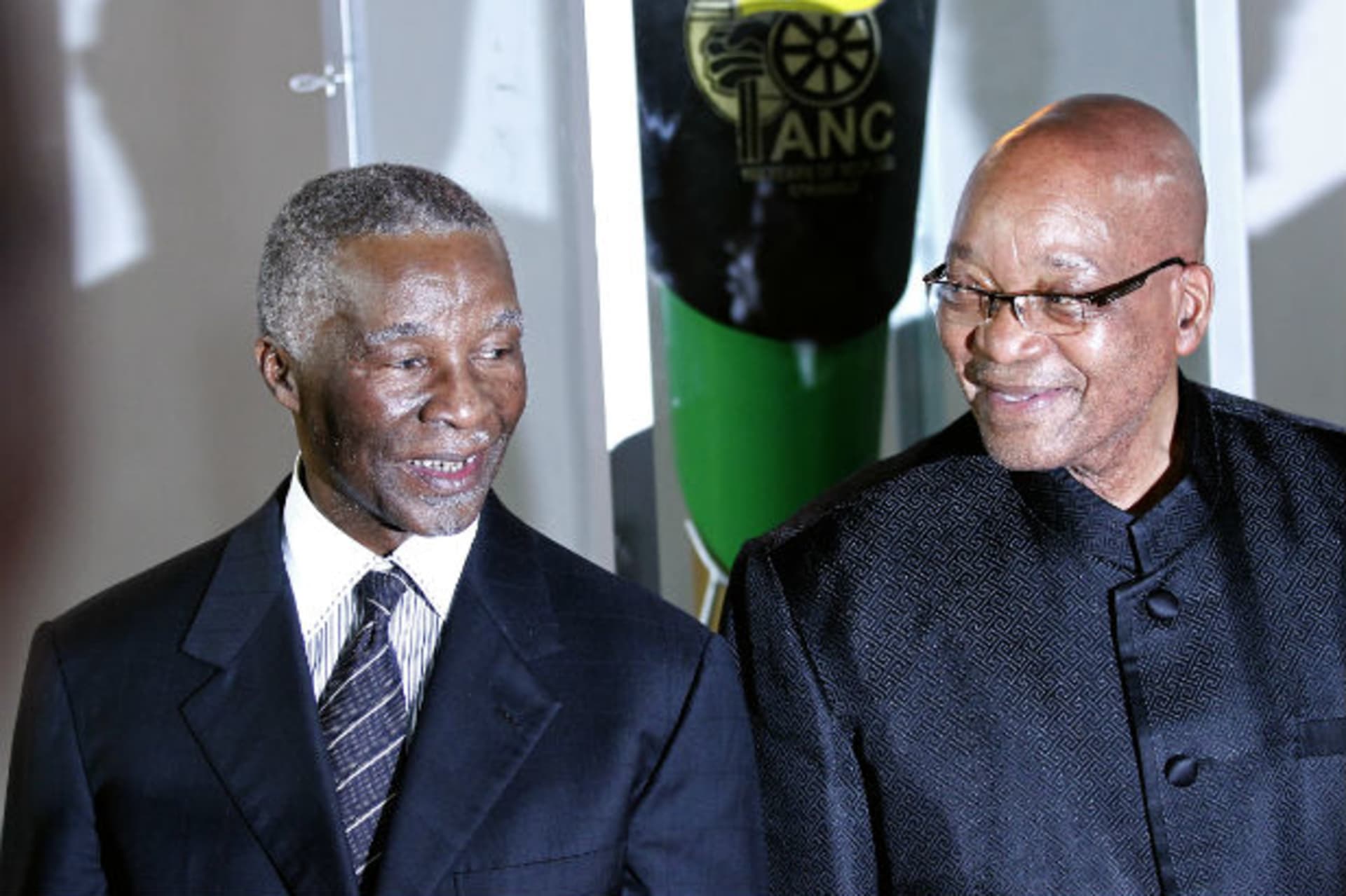 South Africa's President Jacob Zuma (R) pose with former president Thabo Mbeki during the lighting up ceremony of the centenary torch ahead of the upcoming African National Congress (ANC) centenary celebration in Bloemfontein January 8, 2012.
