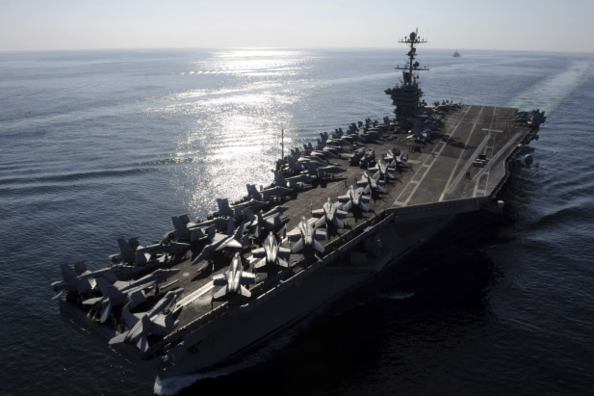 <p>The USS John C. Stennis aircraft carrier in the Strait of Hormuz in January 2012 (Courtesy Reuters).</p>
