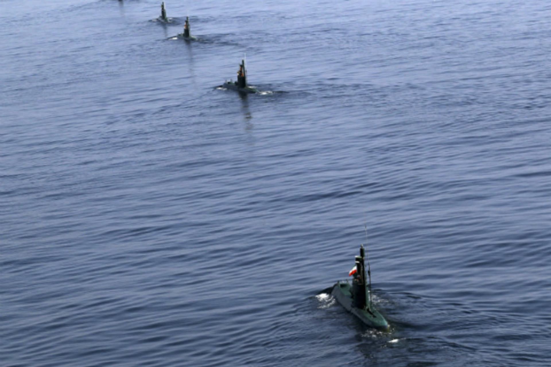 <p>Iranian submarines take part in a naval parade near the Strait of Hormuz (courtesy Reuters).</p>
