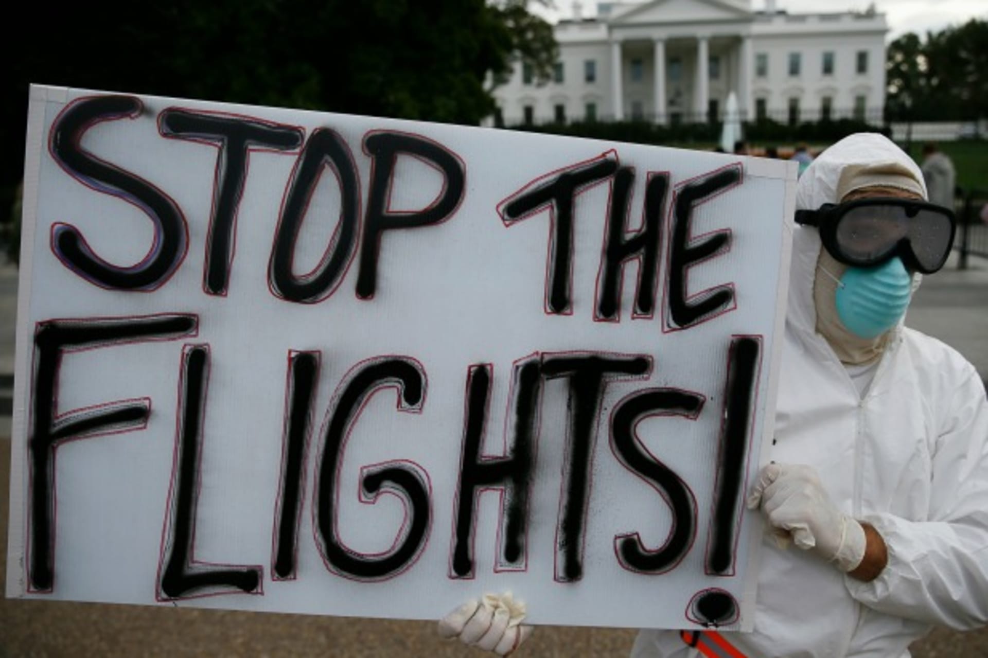 <p>Protestor Jeff Hulbert of Annapolis, Maryland holds a sign reading “Stop the Flights” as he demonstrates in favor of a travel …e in Washington October 16, 2014. REUTERS/Jim Bourg (UNITED STATES – Tags: POLITICS HEALTH CIVIL UNREST TPX IMAGES OF THE DAY)</p>
